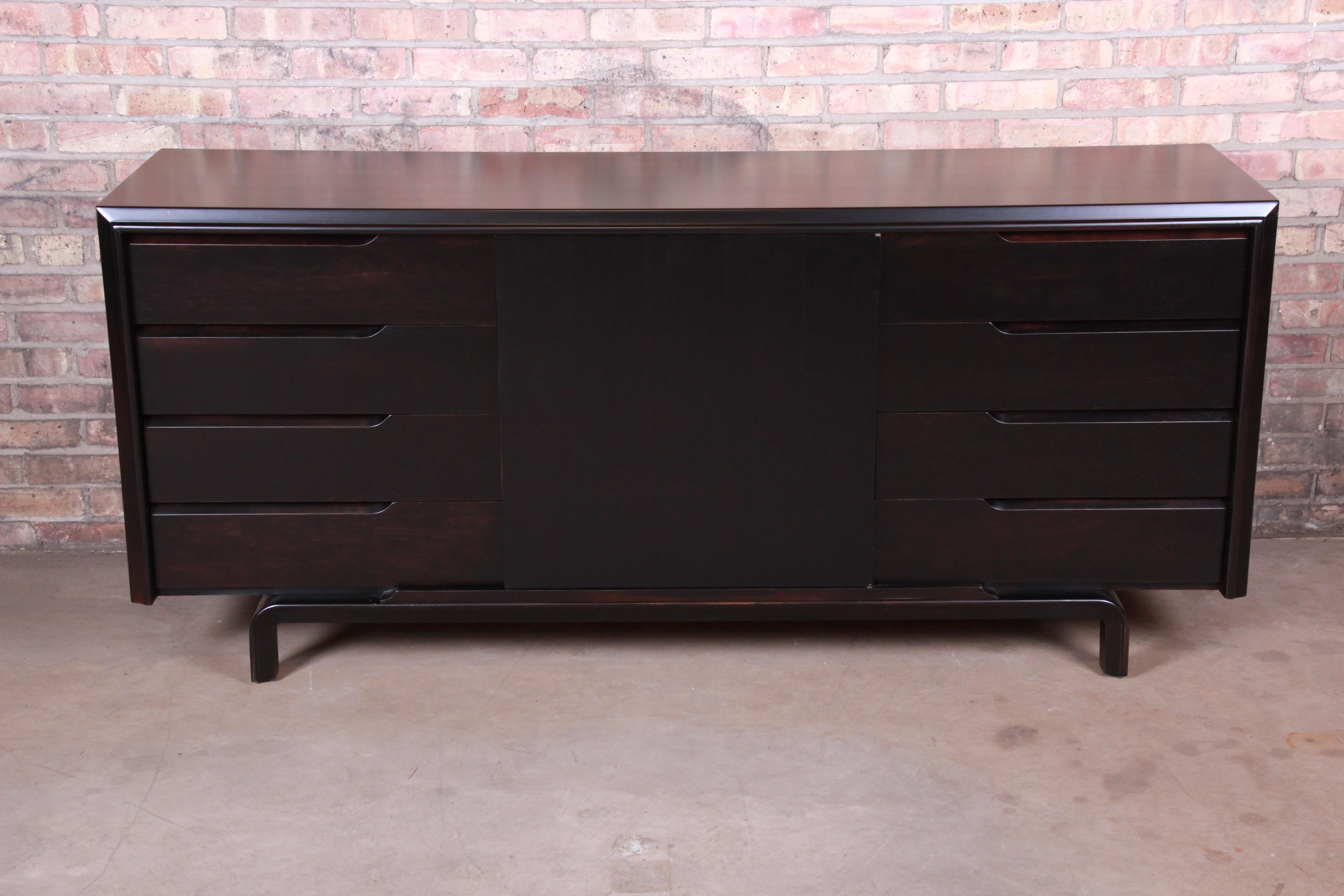 An exceptional midcentury Swedish Modern ebonized birch sideboard credenza or bar cabinet

By Edmond Spence

Sweden, 1950s

Measures: 72