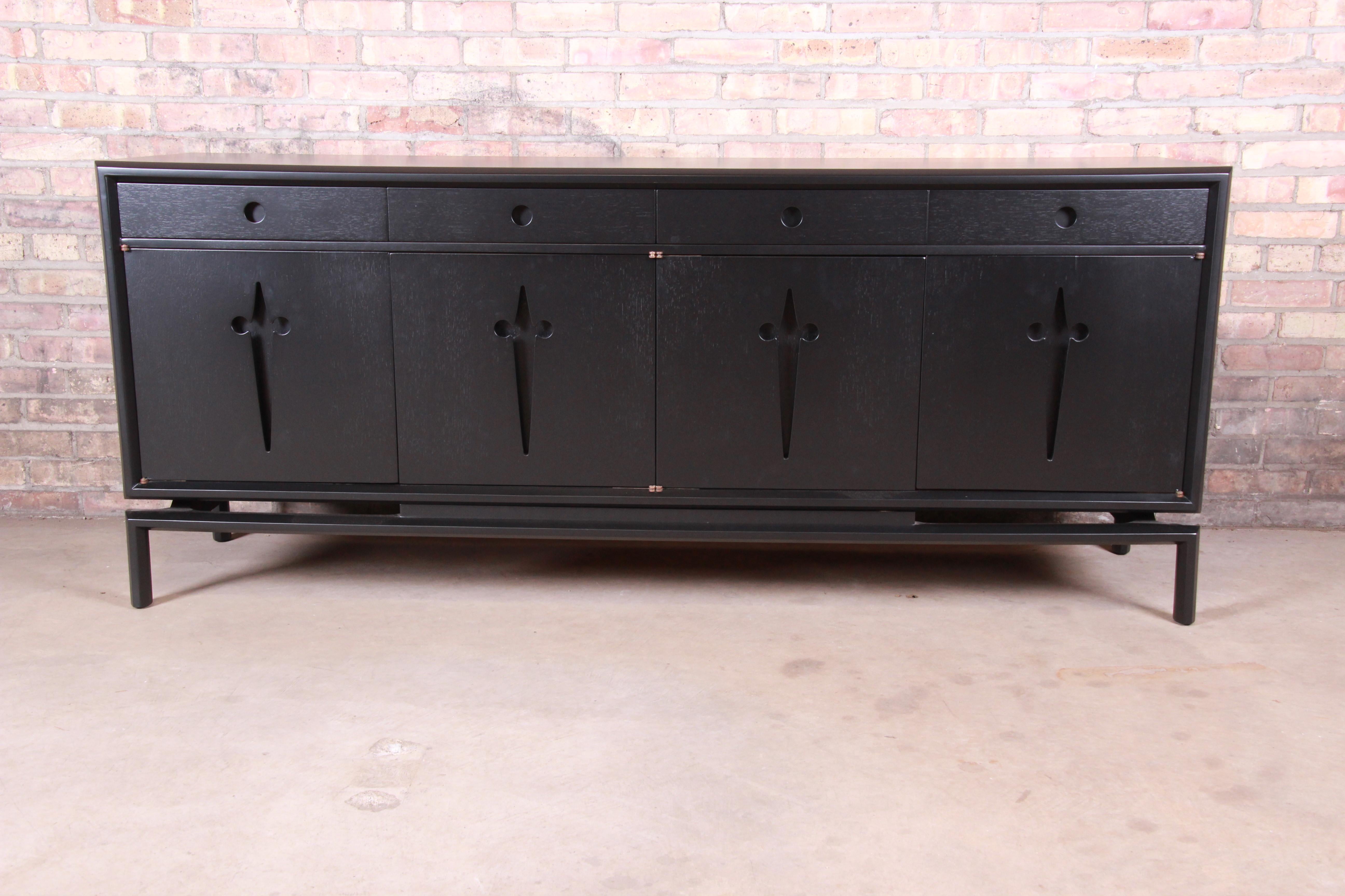 An exceptional midcentury Swedish Modern ebonized birch sideboard credenza or bar cabinet

By Edmond Spence

Sweden, 1950s

Measures: 75