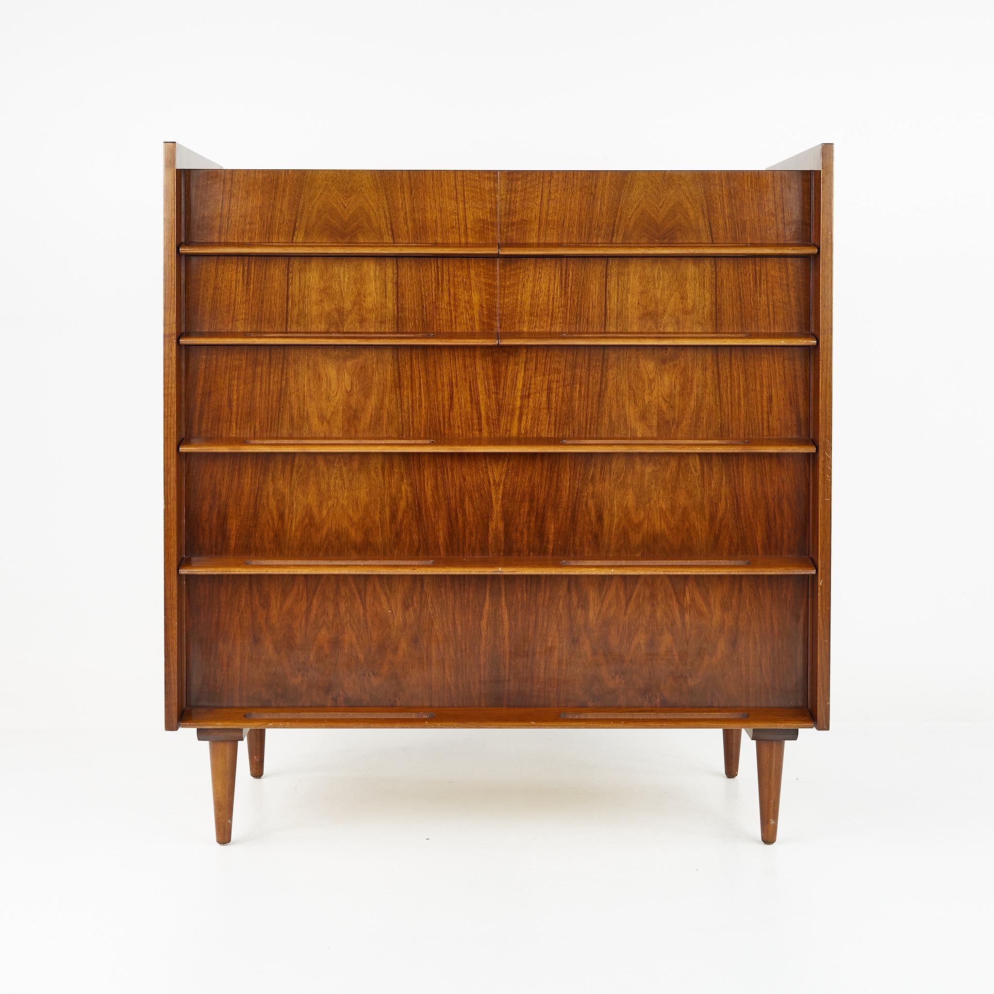 Edmund Spence coronation mid century walnut highboy dresser

This dresser measures: 42 wide x 18 deep x 45 inches high

?All pieces of furniture can be had in what we call restored vintage condition. That means the piece is restored upon