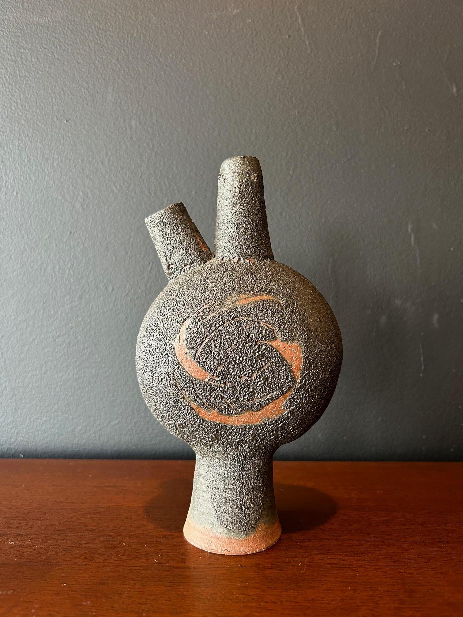Edna Arnow ceramic bud vase with volcanic two tone glaze.