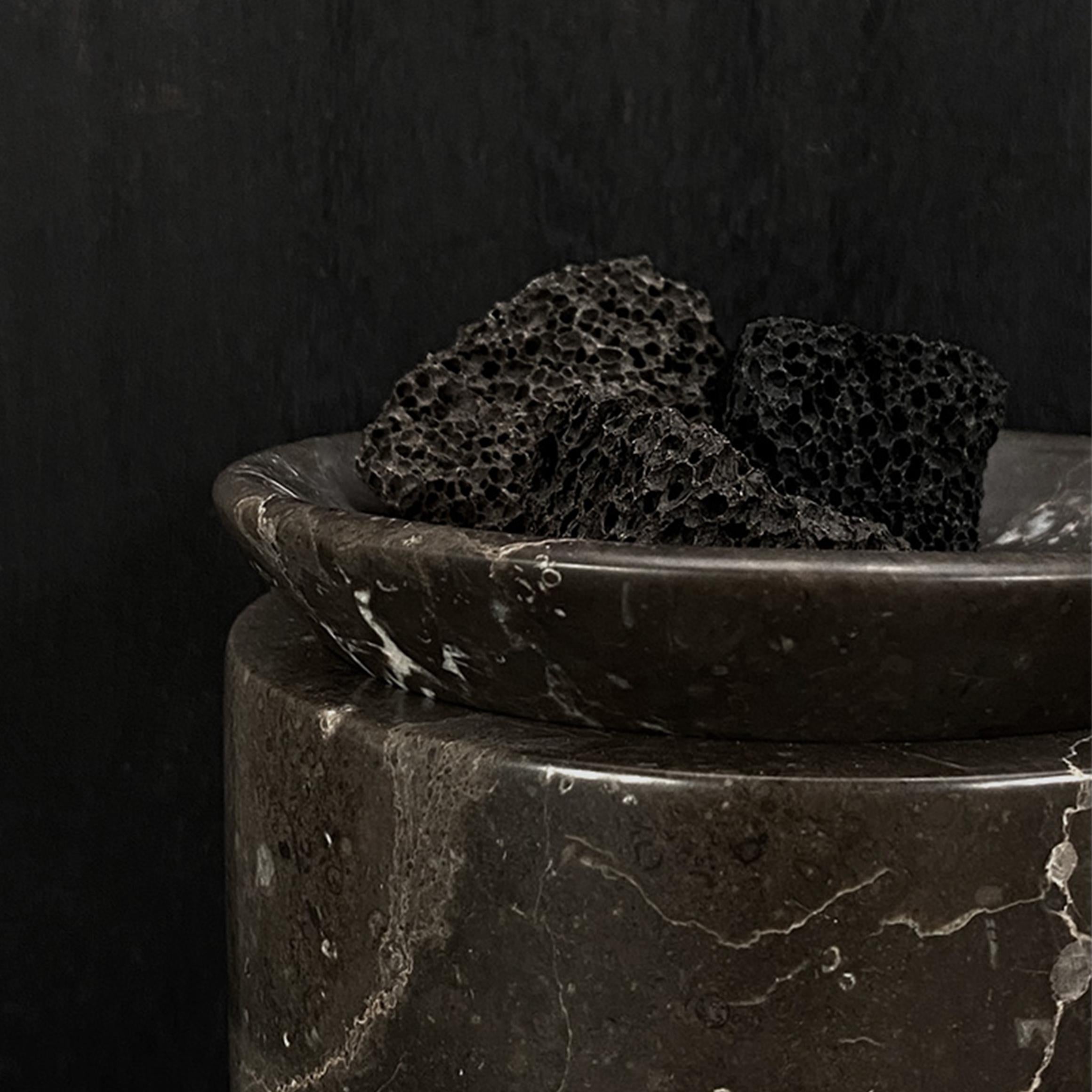 EDO Canister Large in the colour shadow black is a beautiful marble jar with a small elevation in the lid. This simple and lovely canister or jar has an exclusive and timeless look that adorns all spaces. Because the marble is a natural stone, the