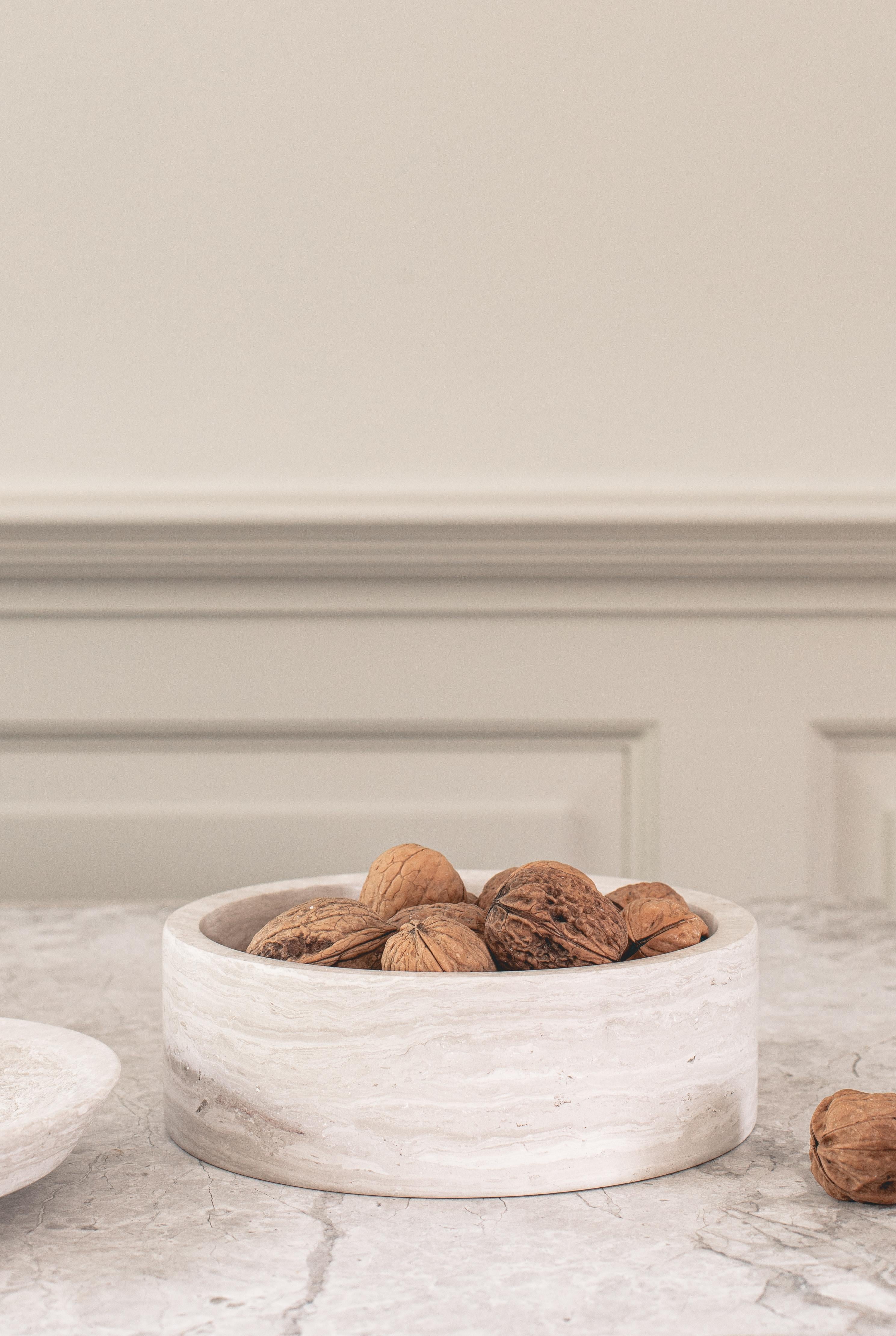 EDO Canister low in the colour chalk grey (beige) is a beautiful marble jar with a small elevation in the lid. This simple and lovely canister or jar has an exclusive and timeless look that adorns all spaces. Because the marble is a natural stone,