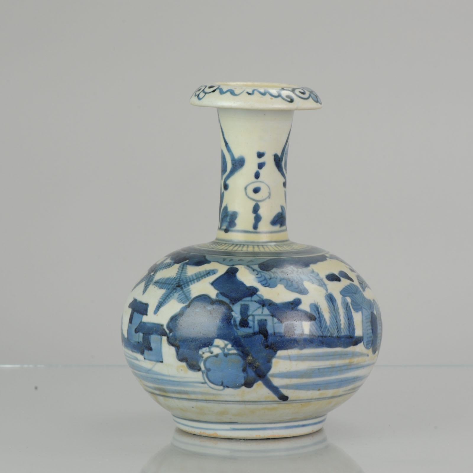 Very nice blue & White Kendi/Ghendi, 200mm high. With a floral landscape scene. Nicely carved also. Beautiful piece!

The 'kendi', a drinking water vessel with a spout but no handle, is a form distinct to Southeast Asia, where it has a long history.