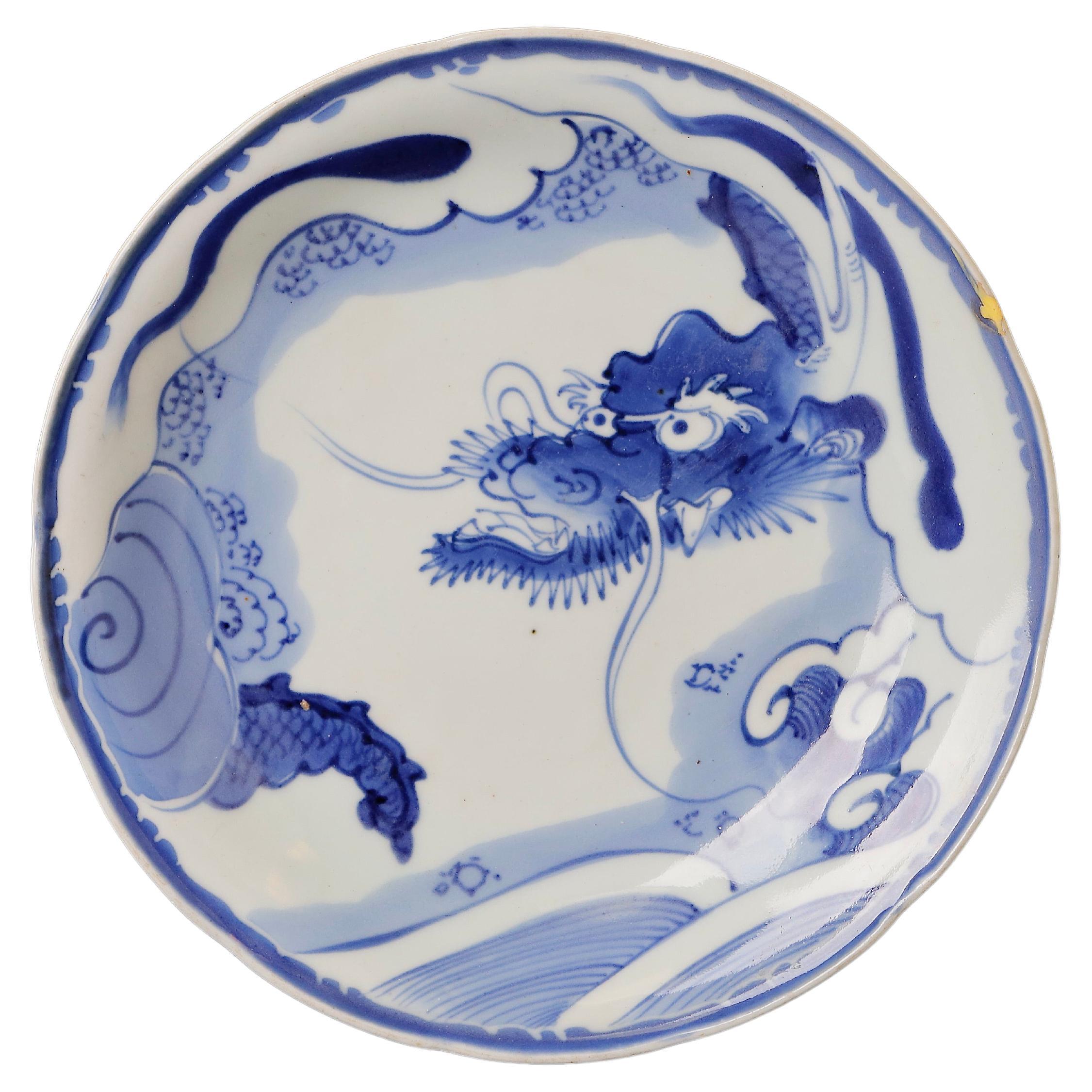 Edo Period Imari Porcelain Plate with Japanese Dragon For Sale