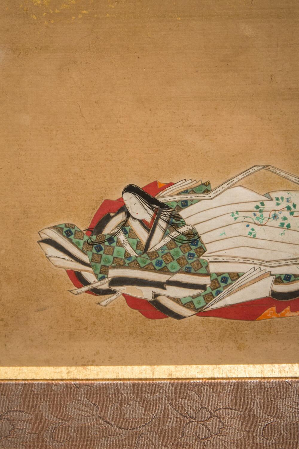 This painting depicts a woman poet sitting under golden rain, attributed to Tosa Naiki (1666-1750)
The technique is ink and color on paper and gold flakes.
It is under glass and has a giltwood frame.
Edo period, 18th century.
Probably based on a
