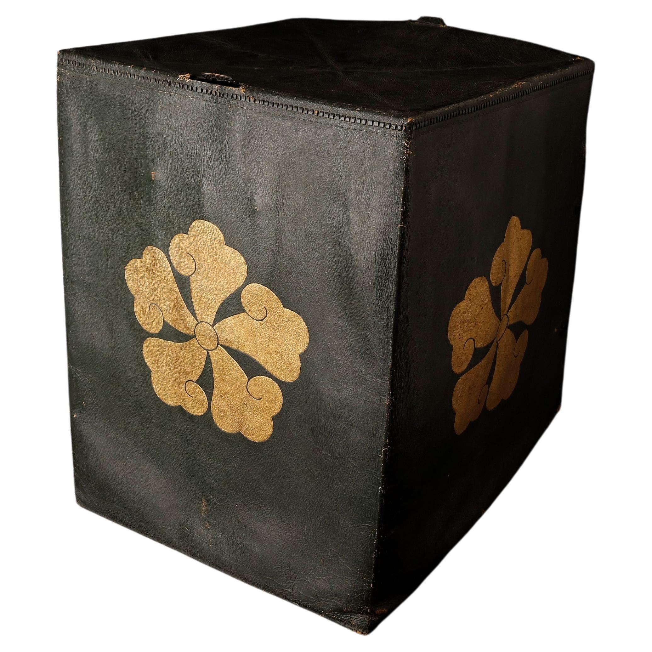 A Rare Leather Cover Decorated with Samurai Clan Crest

This rare leather cover is a stunning example of Japanese craftsmanship. It is dated to the Mid Edo period, circa 17-18th century, and is in very fine condition, with some losses and abrasions