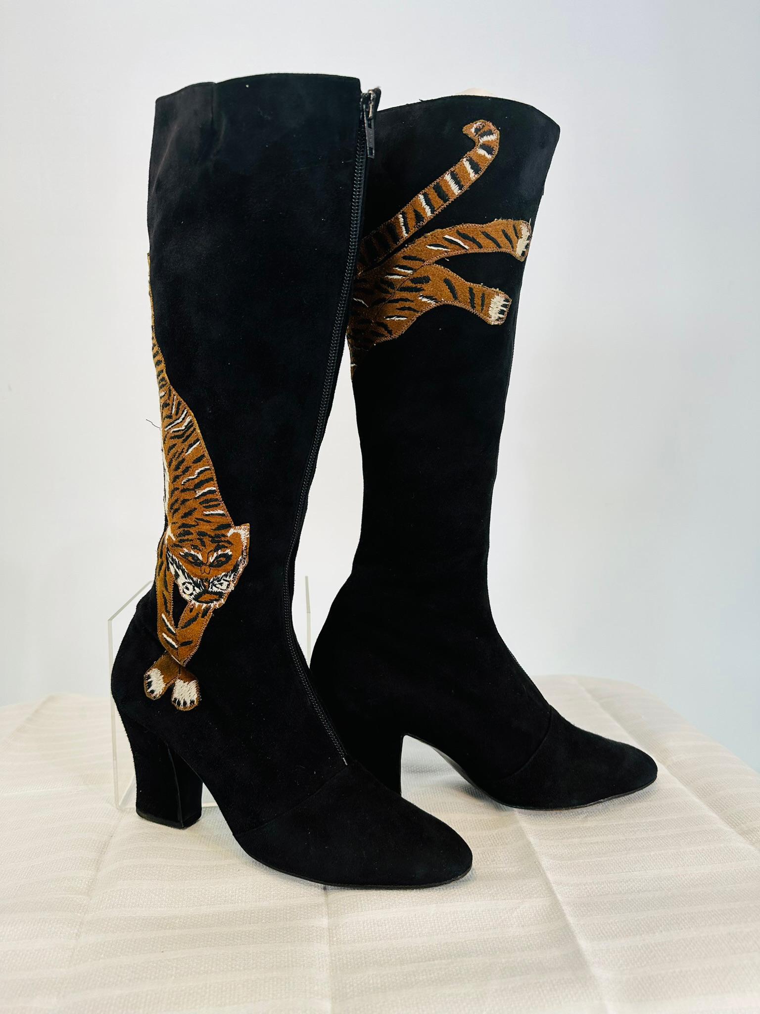 Edouard Jerrold 1960s black suede boots embroidered & appliqued with a tiger twining around each boot shaft. The boots have rounded toes and close at the front with zippers. Chunky shaped heels, leather soles. In very good vintage condition. Marked