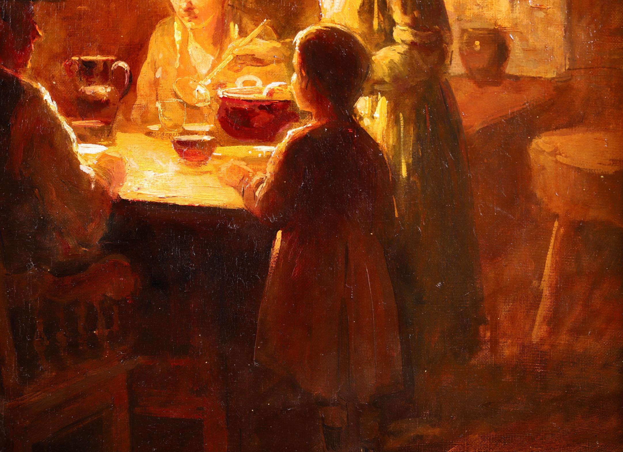 A charming and nostalgic oil on canvas circa 1910 by sought after French impressionist painter Edouard Leon Cortes. The work depicts a family enjoying dinner in a typical Breton kitchen scene. A man and lady are seated at the table while a woman