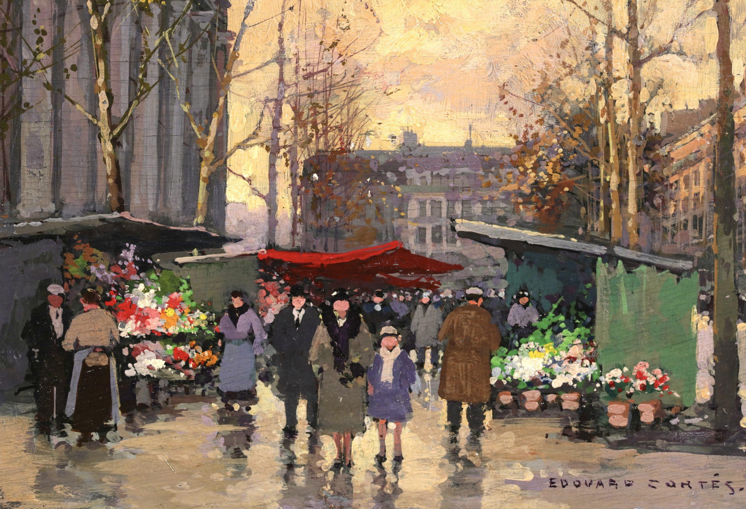Figura firmata in un paesaggio urbano olio su tavola del 1940 circa del ricercato pittore impressionista francese Edouard Cortes. Questa splendida opera dai colori meravigliosi raffigura una veduta del mercato dei fiori di Place de la Madeleine a