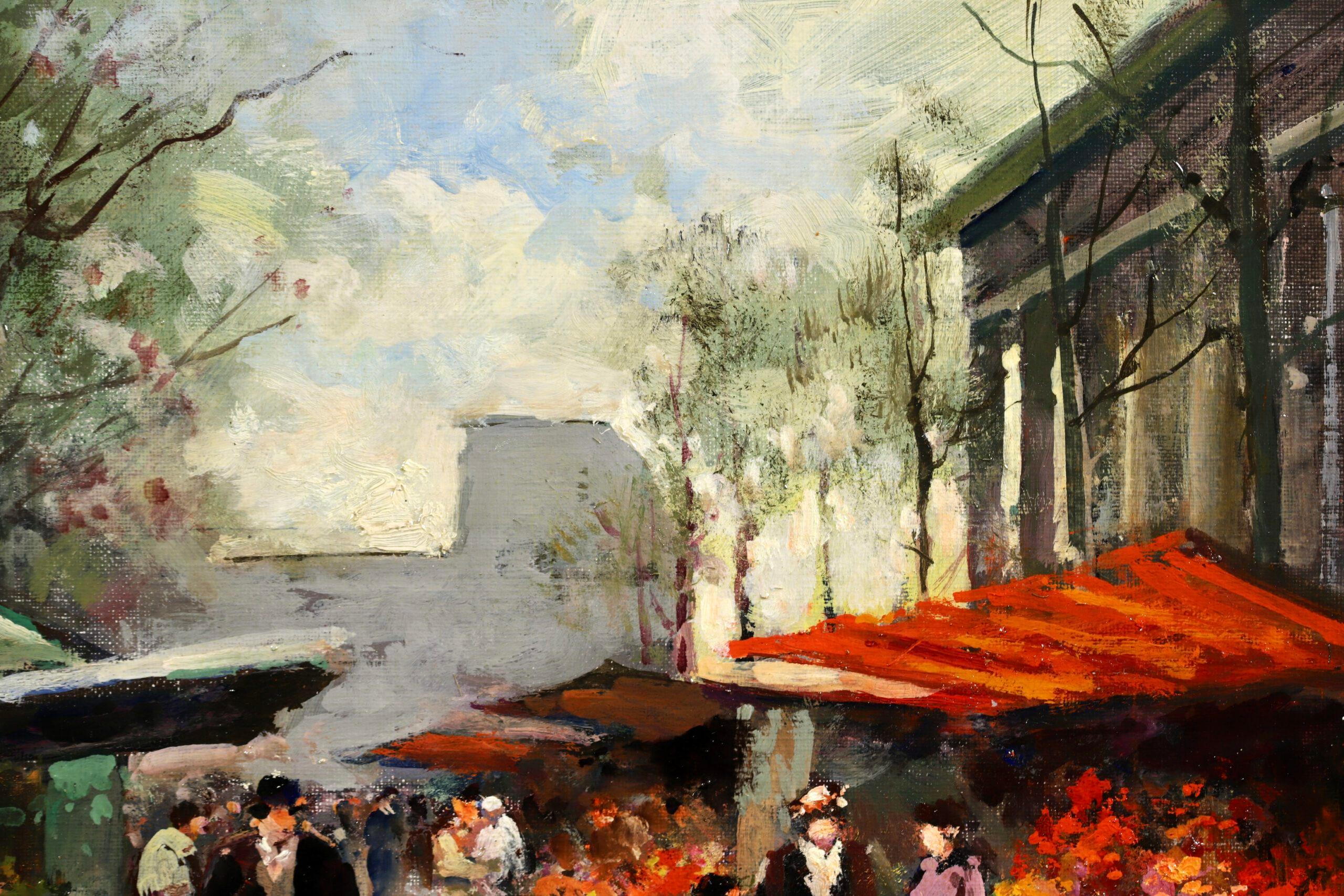 Signed impressionist oil on canvas cityscape circa 1960 by French painter Edouard Leon Cortes. The work depicts figures in the flower market at the Place de la Madeleine in Paris, France. The bright colours of the flowers and the red awnings