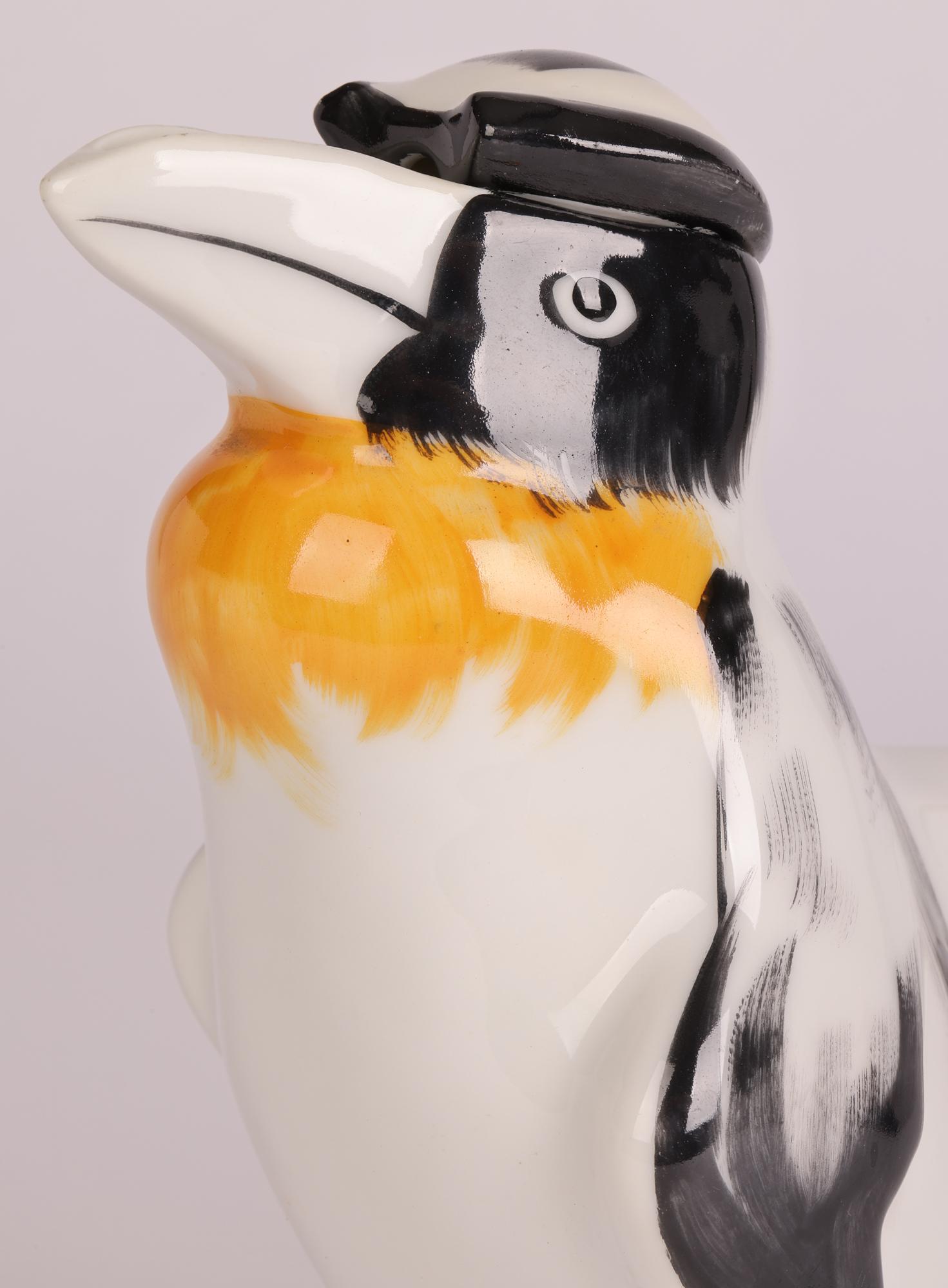A rare and unusual French Theodore Havilland Limoges penguin shaped porcelain teapot designed by renowned Swiss sculptor Edouard-Marcel Sandoz (Swiss, 1881-1971) and dating from around 1930. The body of the teapot is shaped as a penguin with its