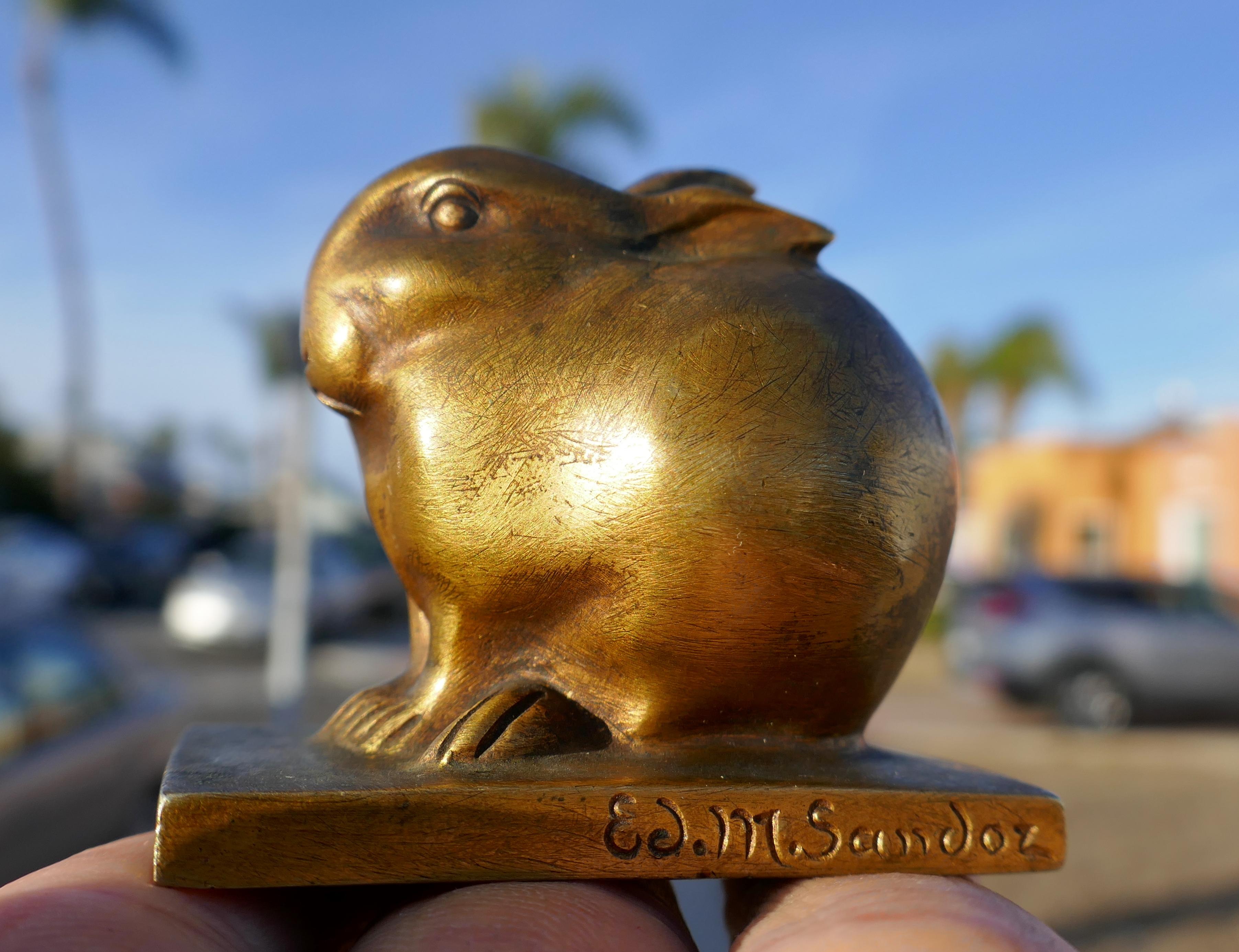 Fine original early 1900s cast bronze Rabbit with a Gold Ormolu finish by Edouard-Marcel Sandoz. Sandoz is well known for his animal sculptures. He apprenticed under the sculptor Antonin Mercie and the painter Ferdinand Cormon. Due to the metal