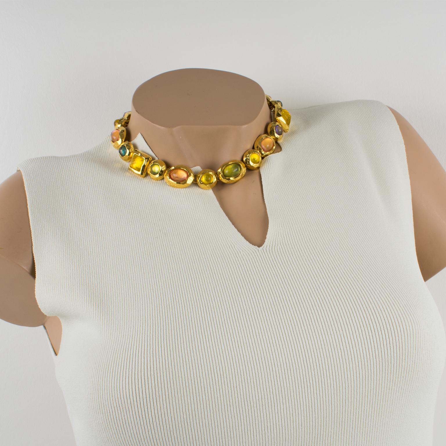 Stunning French designer Edouard Rambaud Paris jeweled choker necklace. Around the necklace shape with a shiny gilded metal framing ornate with round, square, and ovoid-shaped resin cabochons. Assorted colors of yellow, light pink, purple lavender,