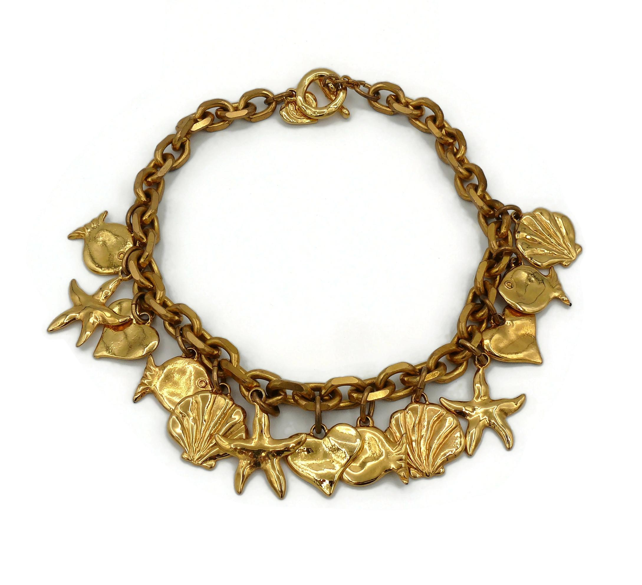 EDOUARD RAMBAUD vintage gold toned necklace featuring a chunky chain, sea life charms and hearts.

Embossed EDOUARD RAMBAUD Paris.

T-bar and toggle closure.

Indicative measurements :  length approx. 45 cm (17.72 inches) / chain width approx. 1.2