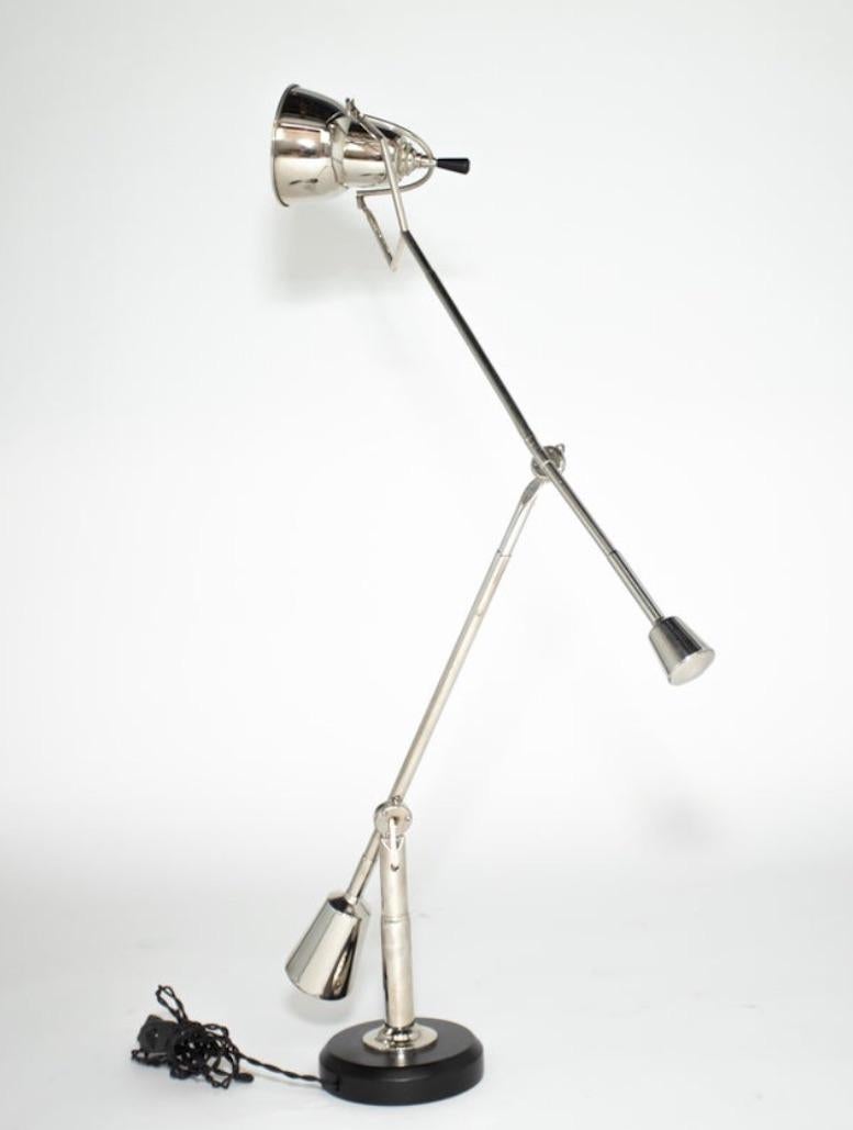 An original vintage Edouard Wilfred Buquet Table Lamp.
Beautiful nickel Surface
Multi positional 
