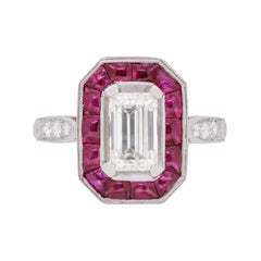 EDR Certified 1.10 Carat Emerald Cut Diamond and Ruby Halo Ring, circa 1950s