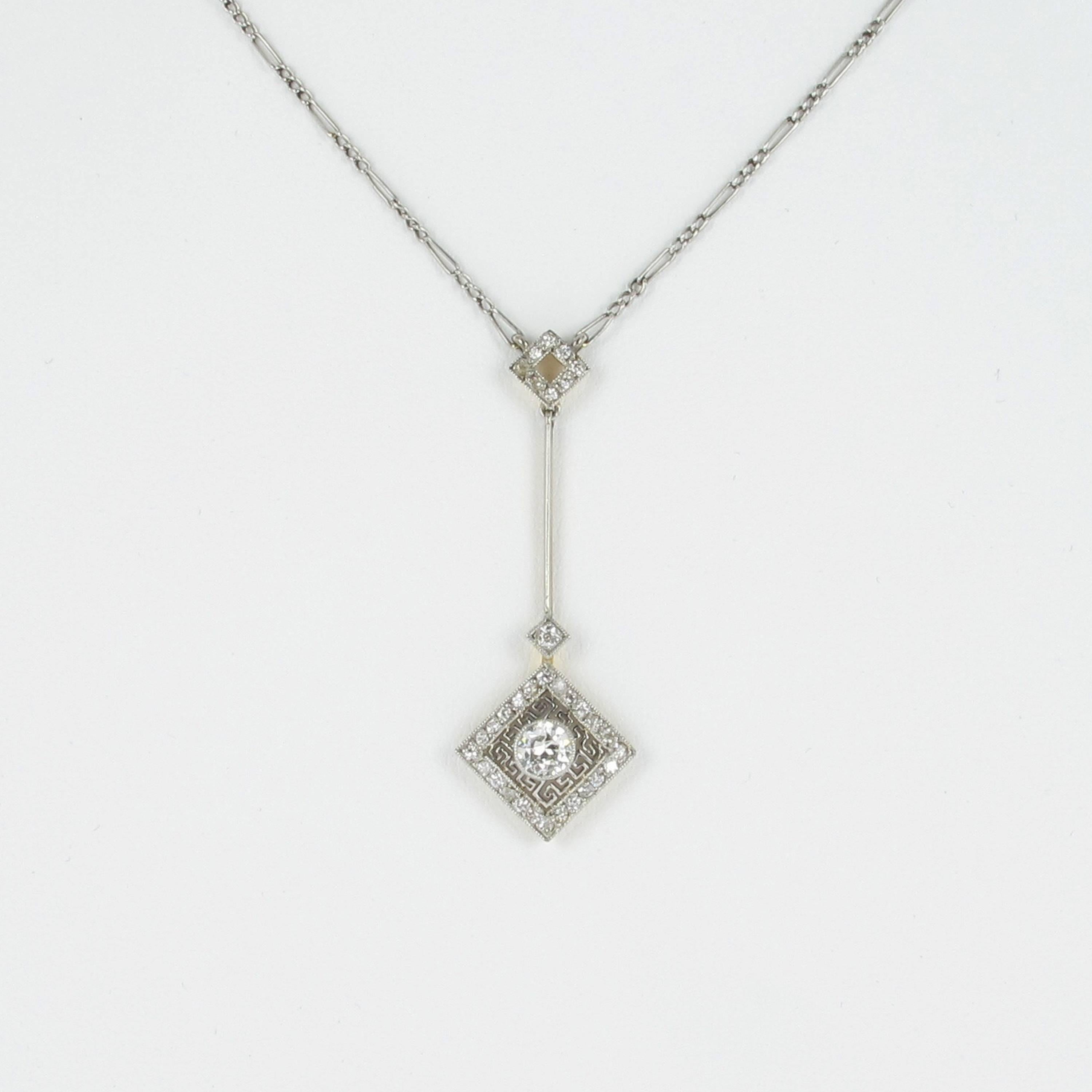 Edwardian diamond lavalière necklace in platinum 950 and yellow gold 750. Three square shaped parts all set with diamonds. The main old cut diamond weighs approx. 0.35 ct, additional rose cuts of approx. 0.30 ct. Millegriffe settings and very fine