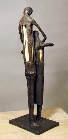 Learning to Fly, by Eduardo Oropeza, bronze, sculpture, father, child, brown
