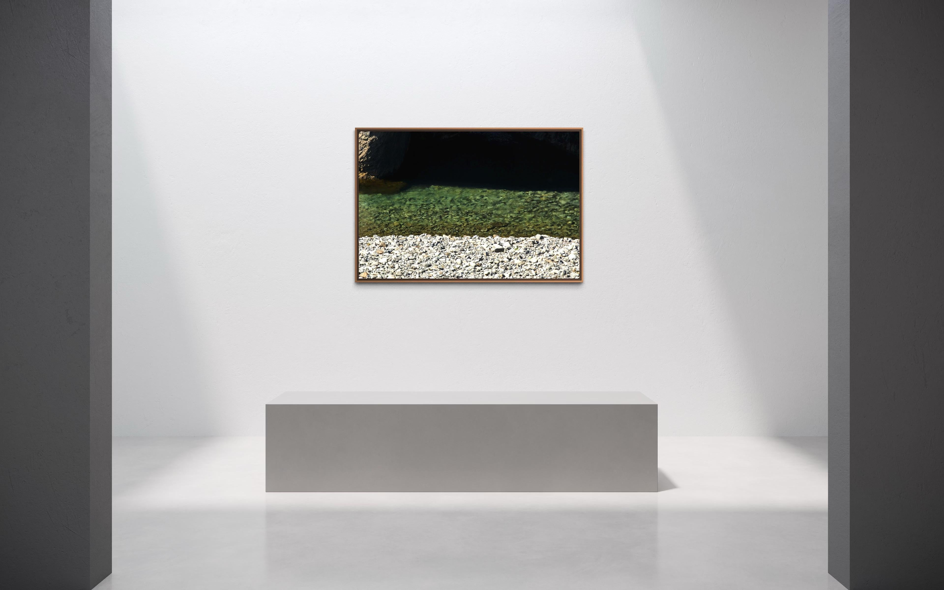 In Shallow Lines, Eduardo Rezende captures the quiet geometry of nature — where stone, water, and shadow meet in perfect stillness. The composition unfolds in three abstract bands, revealing a minimal yet powerful dialogue between texture and