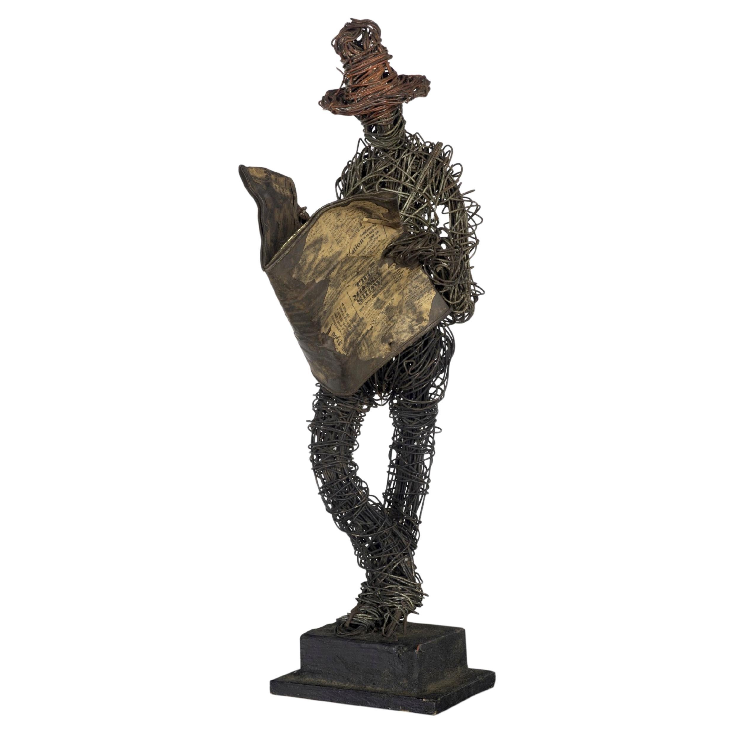 Eduardo Torres MCM Wire Newspaper Reader Sculpture en venta
