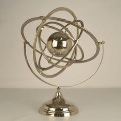 Education Model Sculpture in Chrome of Rotating and Revolving Planet Rings