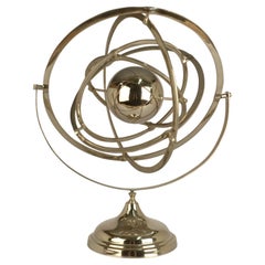 Education Model Sculpture in Chrome of Rotating and Revolving Planet Rings