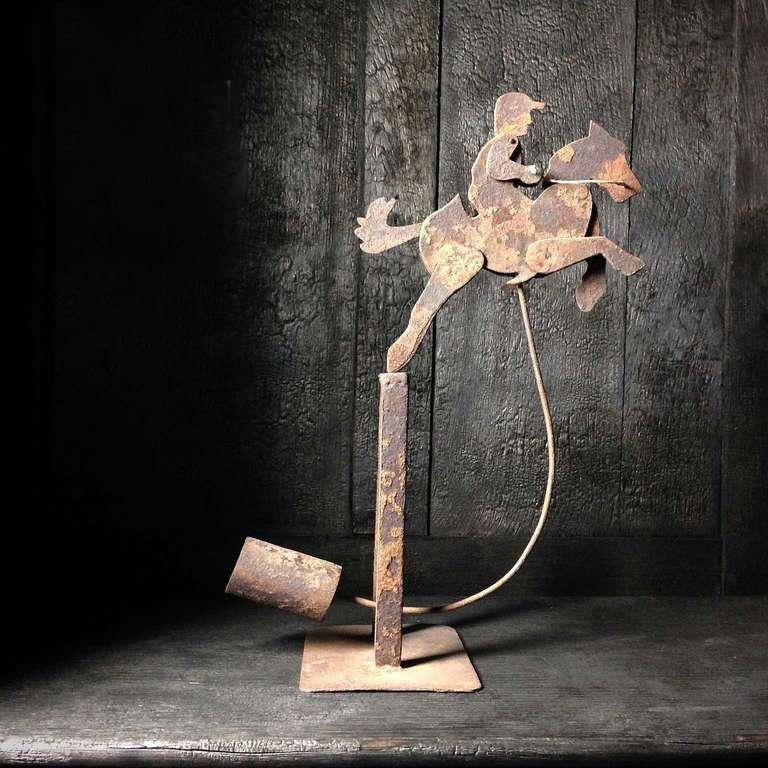 This 1920s pendulum horse toy was originally designed by Louis C. Petersen. 
He was the Director of Manual Arts, State Normal University, Carbondale, Illinois. 
Since then many fathers and boys have created one of his many designs. 

What a nice