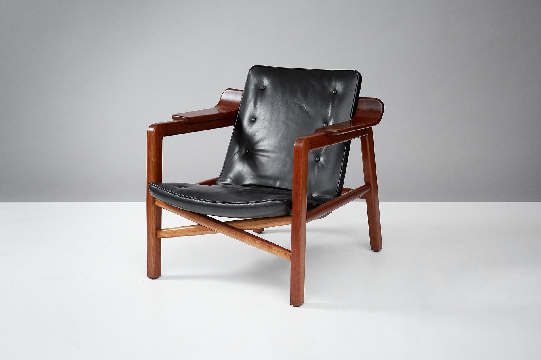 Edvard & Tove Kindt-Larsen

Fireplace Chair, c1939

Cherry wood armchair produced by Gustav Bertelsen, Denmark. Floating seat upholstered in black leather.

The Fireplace chair was the first piece of its kind to separate the upholstered seat