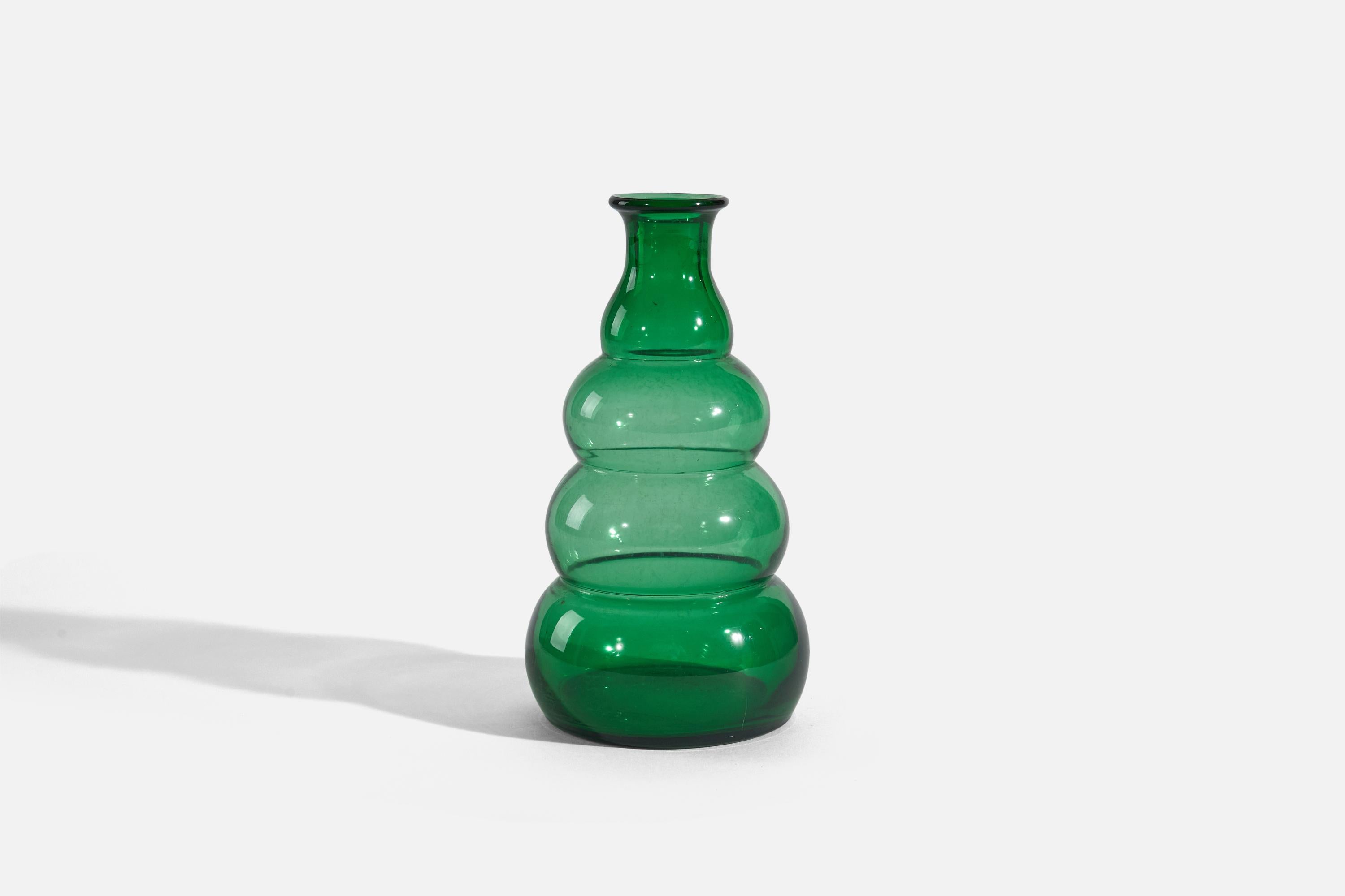 A green glass vase designed by Edvin Ollers and produced by Limmareds Glasbruk, Sweden, c. 1940s.