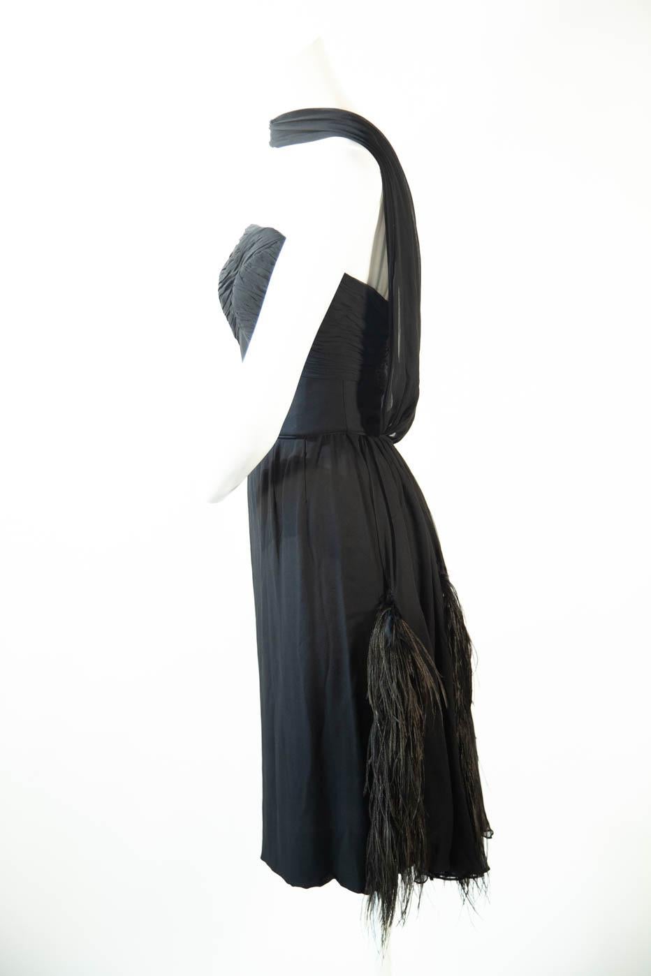 Edward Abbot couture dress owned by celebrity (please ask for provenance) one-shoulder, ostrich feather skirt. Silk.

Provenance, please inquire.