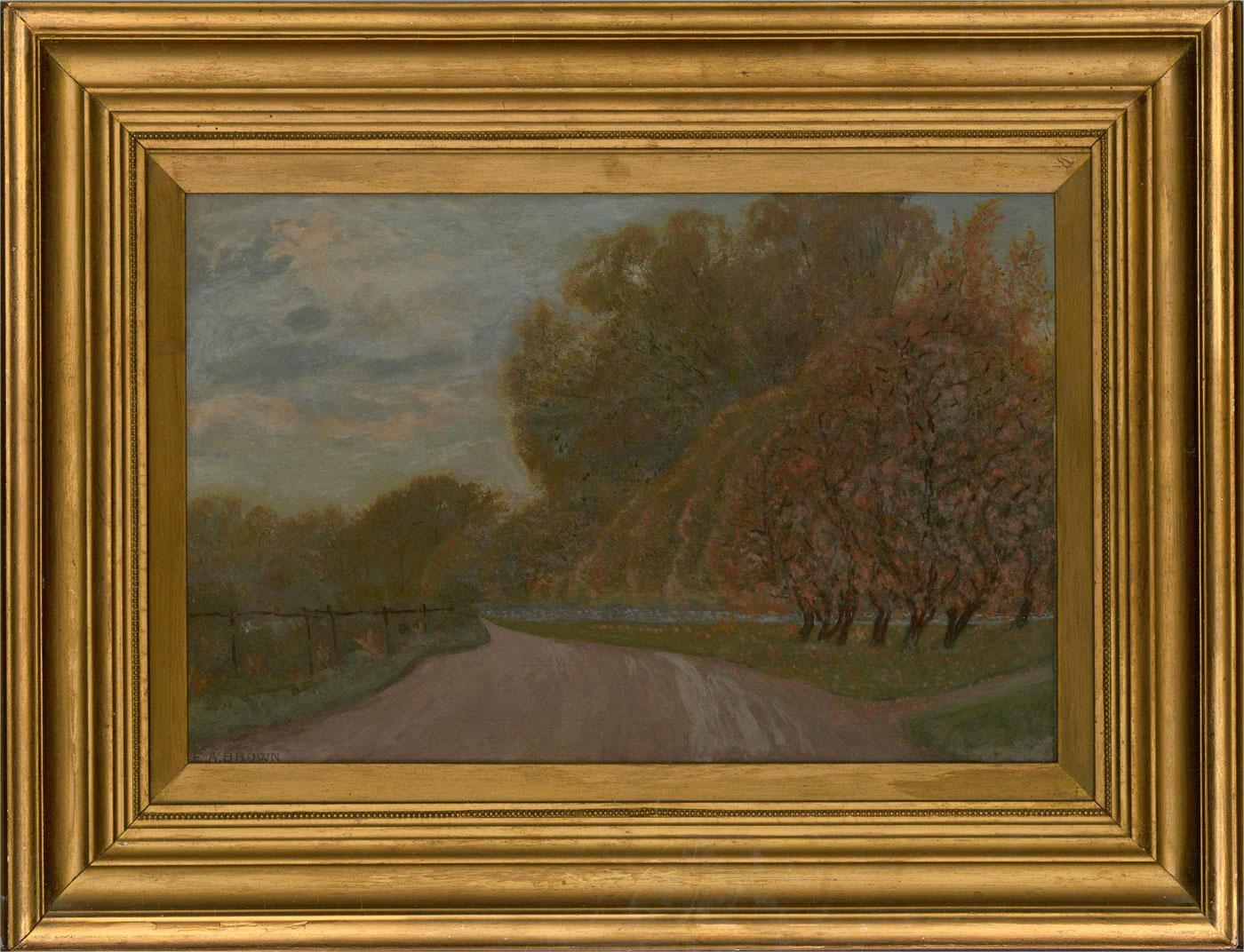 A scene depicting a country track surrounded by autumnal trees. Presented in a gold-painted wooden frame. Signed to the lower-left edge. Inscribed on the verso with the date and title. On canvas board.
