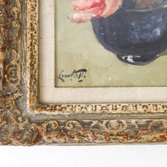 Camelia and white orchids in blue vase