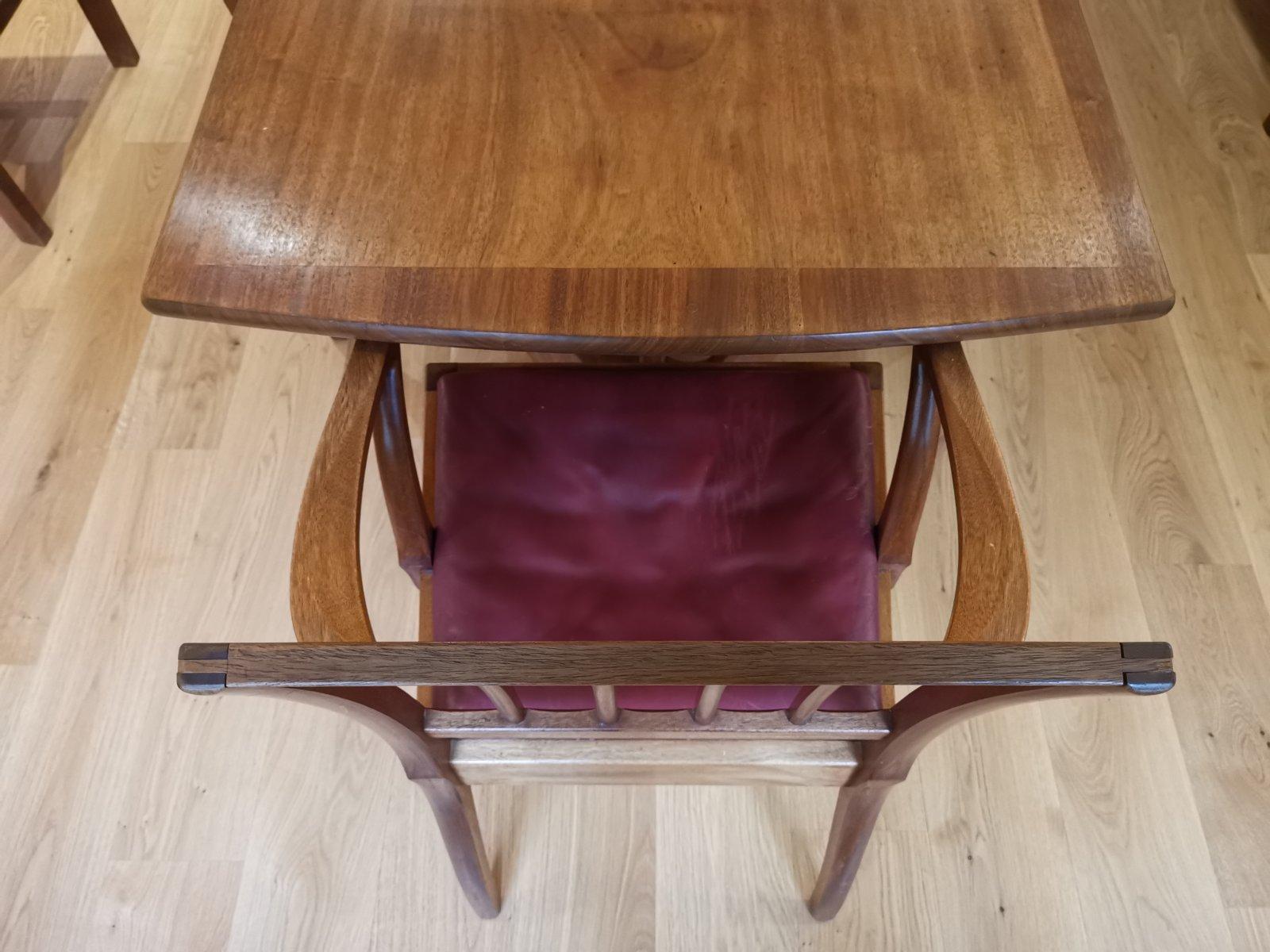 Arts and Crafts Edward Barnsley. An Arts & Crafts Walnut dining table & eight matching chairs. For Sale