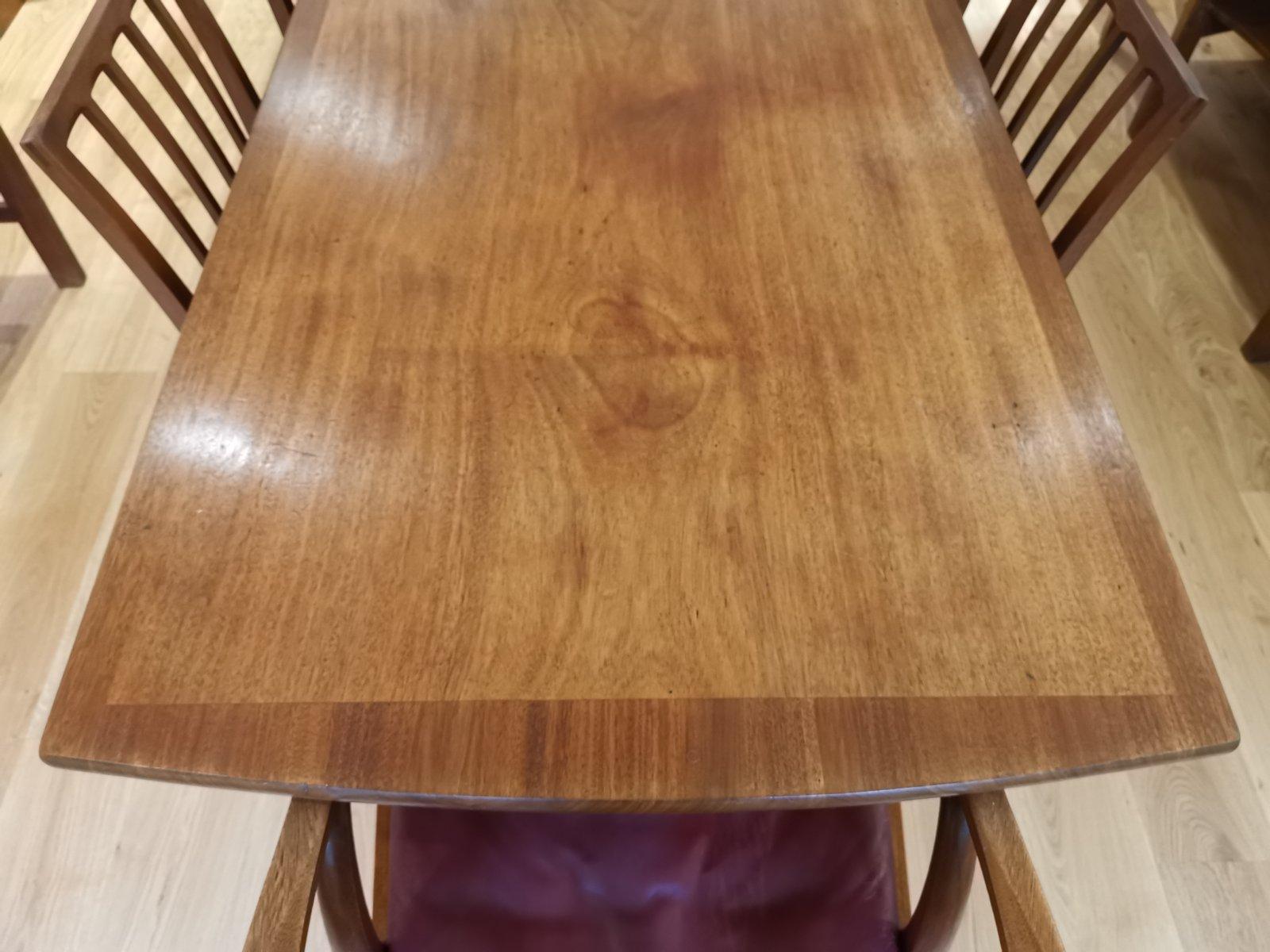 English Edward Barnsley. An Arts & Crafts Walnut dining table & eight matching chairs. For Sale