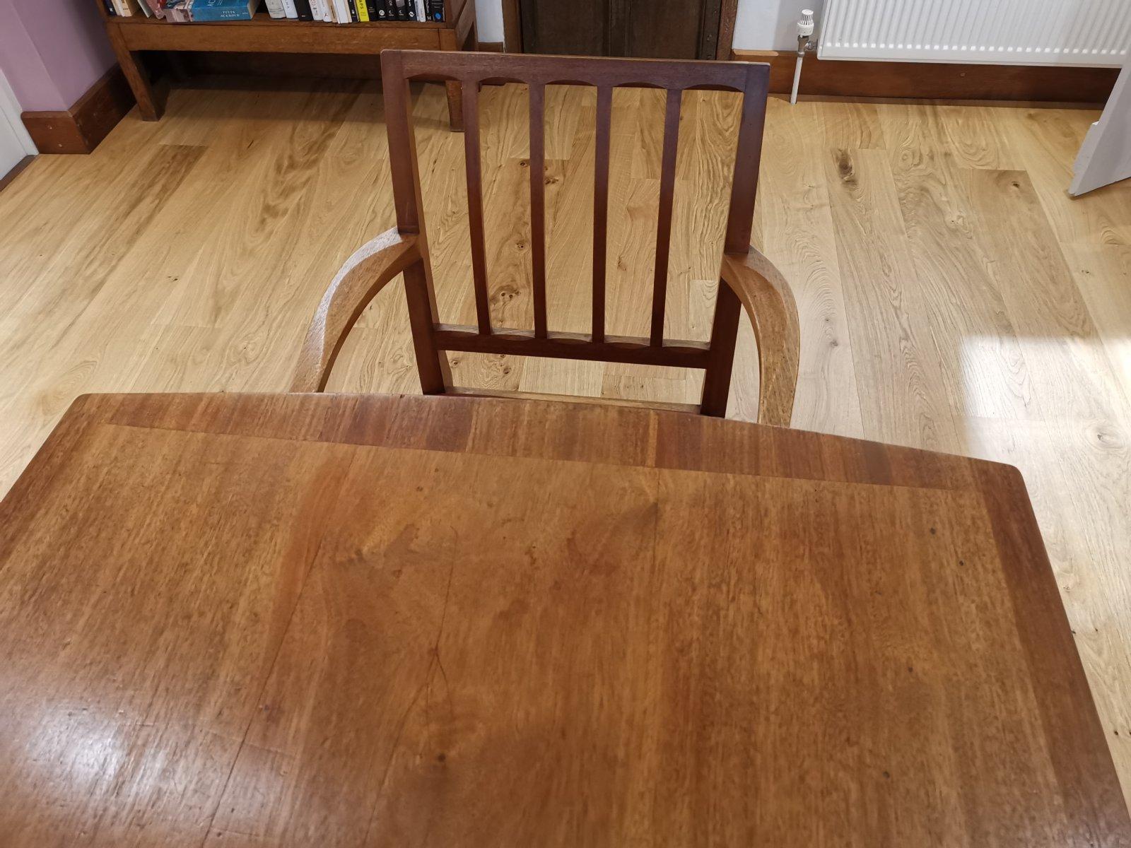 Edward Barnsley. An Arts & Crafts Walnut dining table & eight matching chairs. For Sale 2