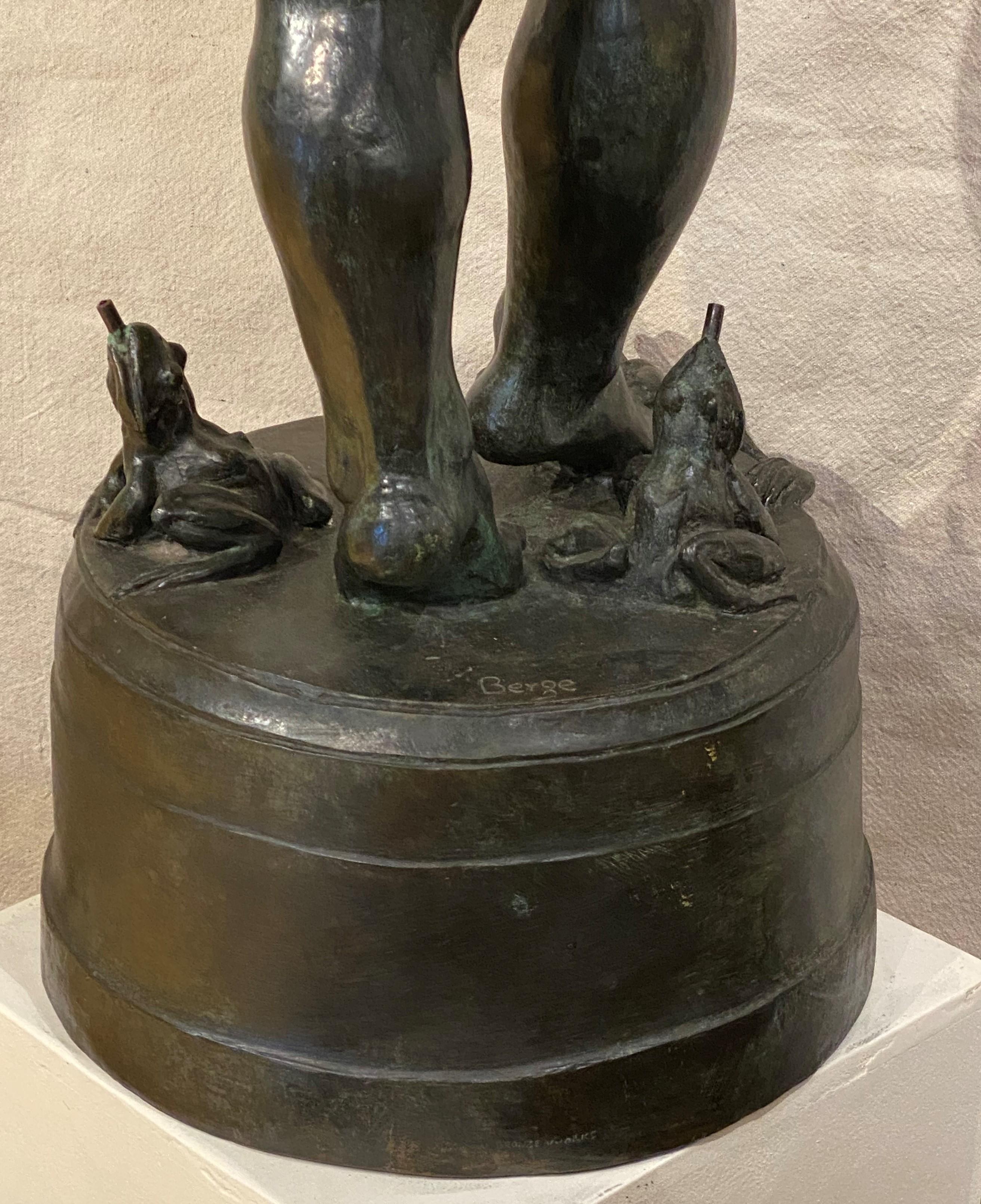 A fine large cast figural bronze fountain of a nude boy with pan flute and three frogs known as “Frog Baby” by American sculptor Edward Berge (1876-1924). Berge was born in Baltimore, MD, studied at the Maryland Institute, Rinehart School in