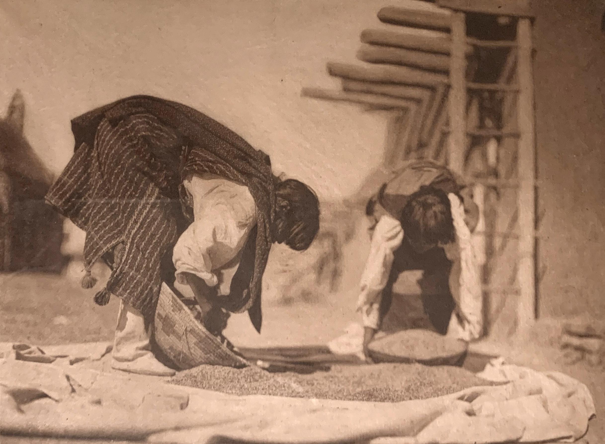 Edward Curtis Black and White Photograph - Cleaning Wheat – San Juan, 1905