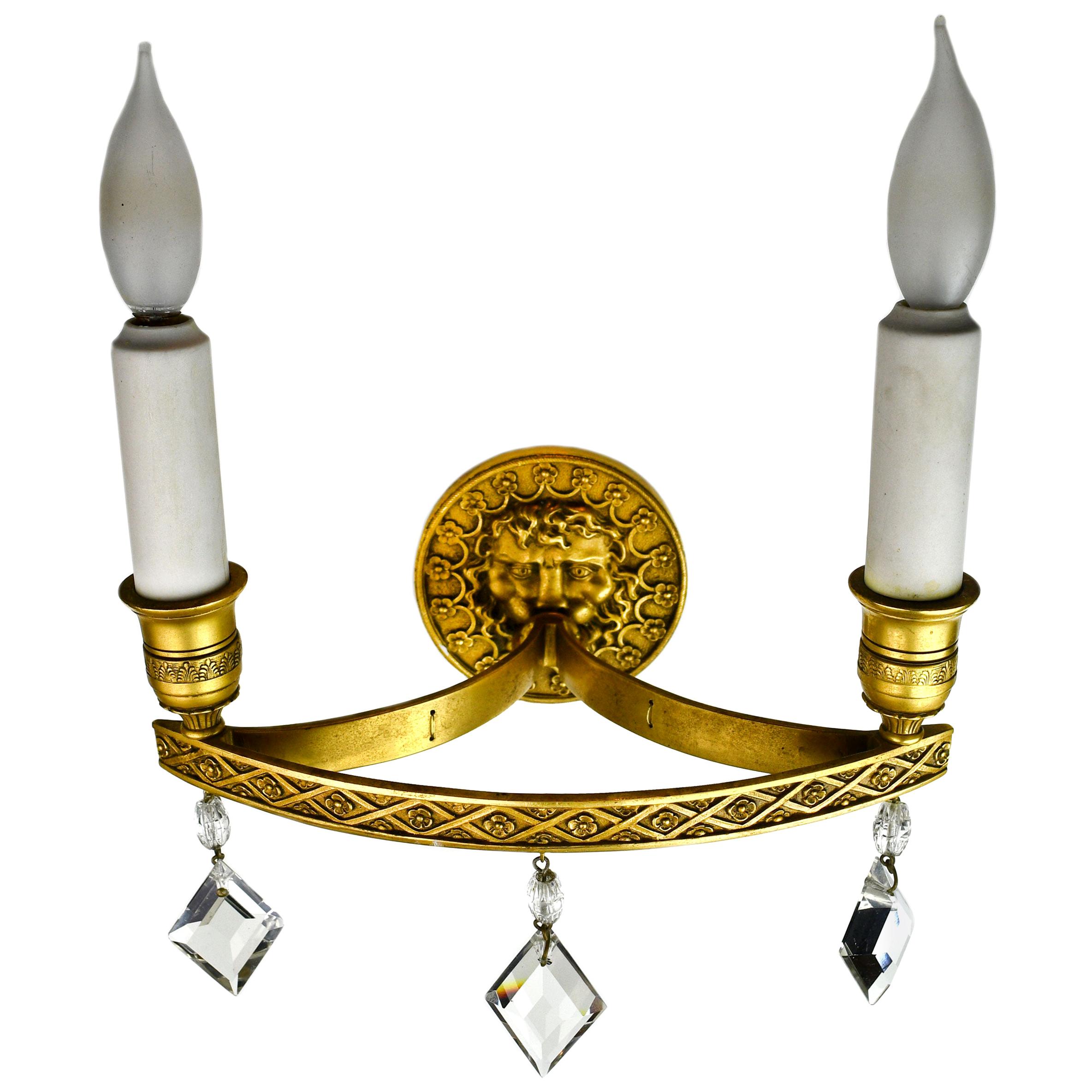 Edward F. Caldwell Brass Sconce with Wind God Design For Sale