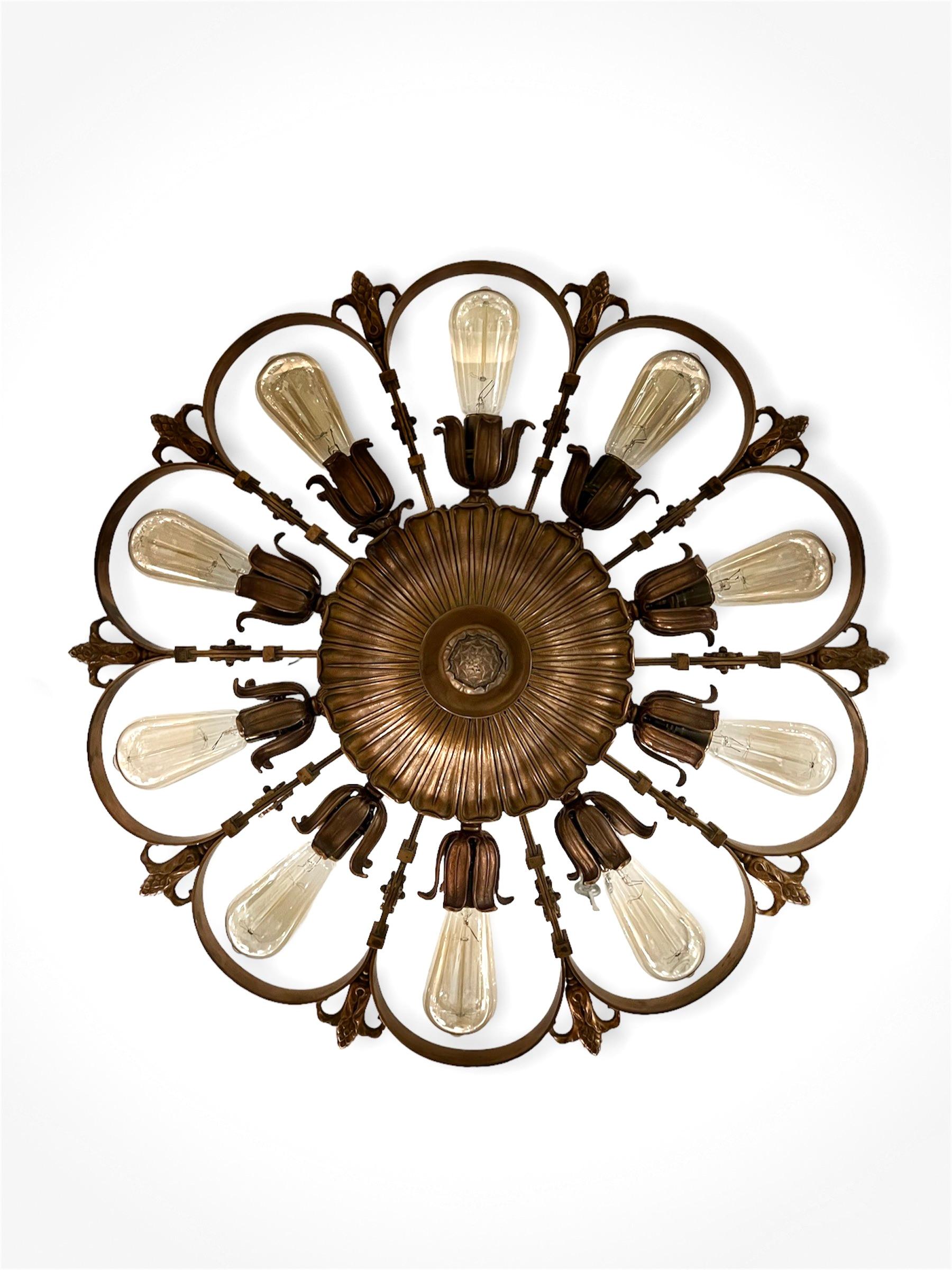 Rare Edward F. Caldwell 10 Light Chandelier with thick patinated bronze frame, USA, circa 1920s.