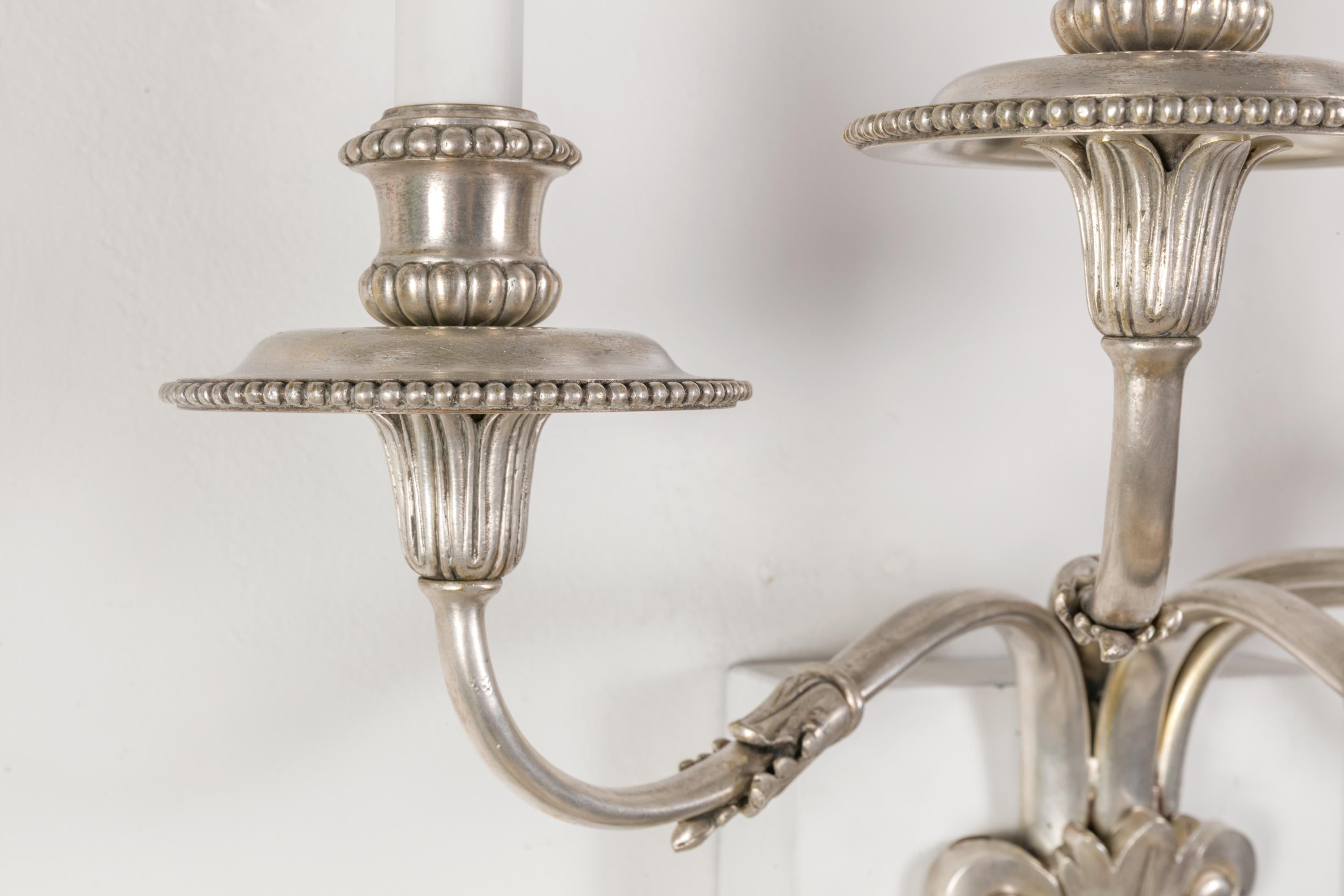 Edward F Caldwell & Co. Silvered Bronze Neoclassical Revival Sconces, USA 1900s In Good Condition For Sale In New York, NY