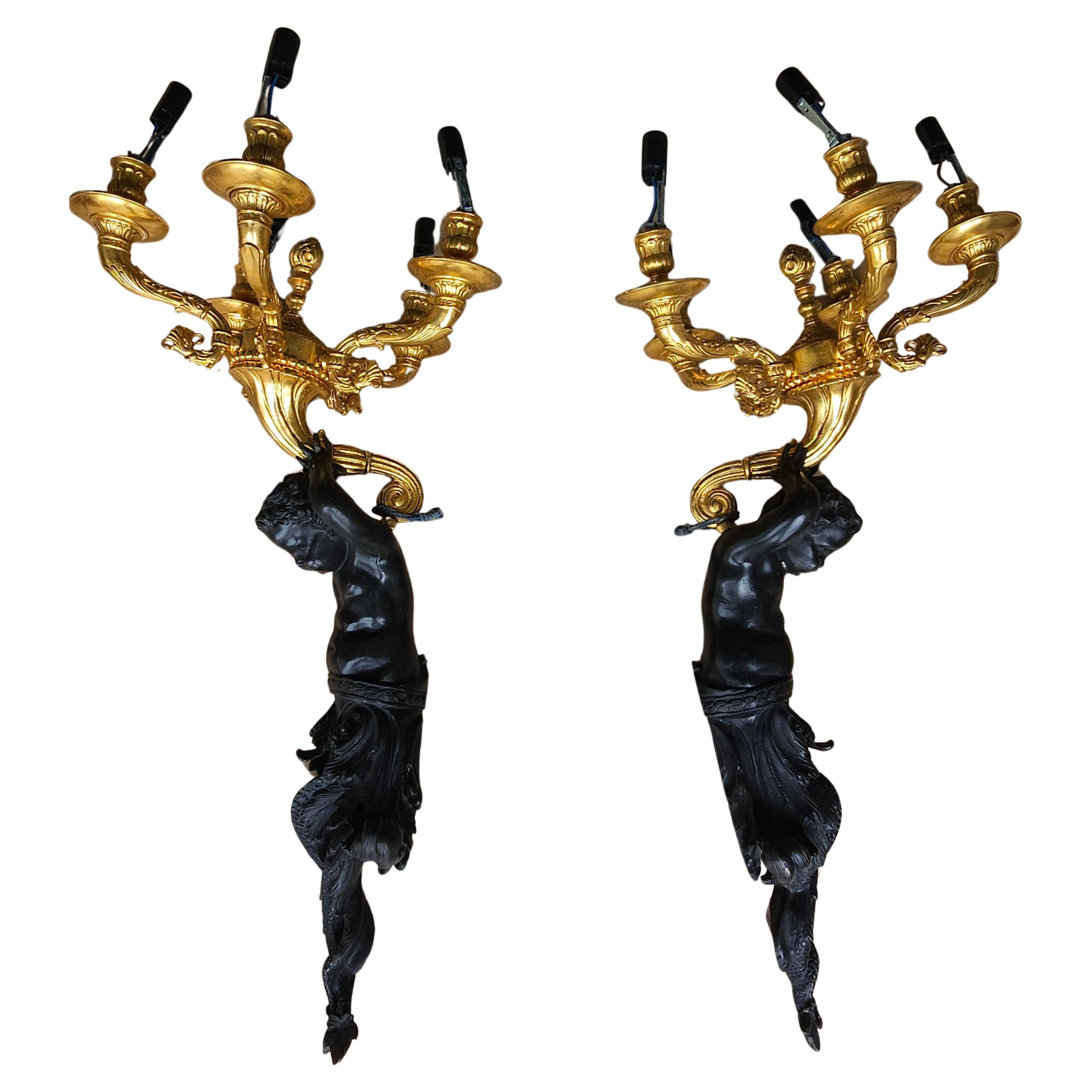 Louis XV Edward F. Caldwell Massive Patinated Bronze Triton Figural 5-Light Sconces, Pair For Sale