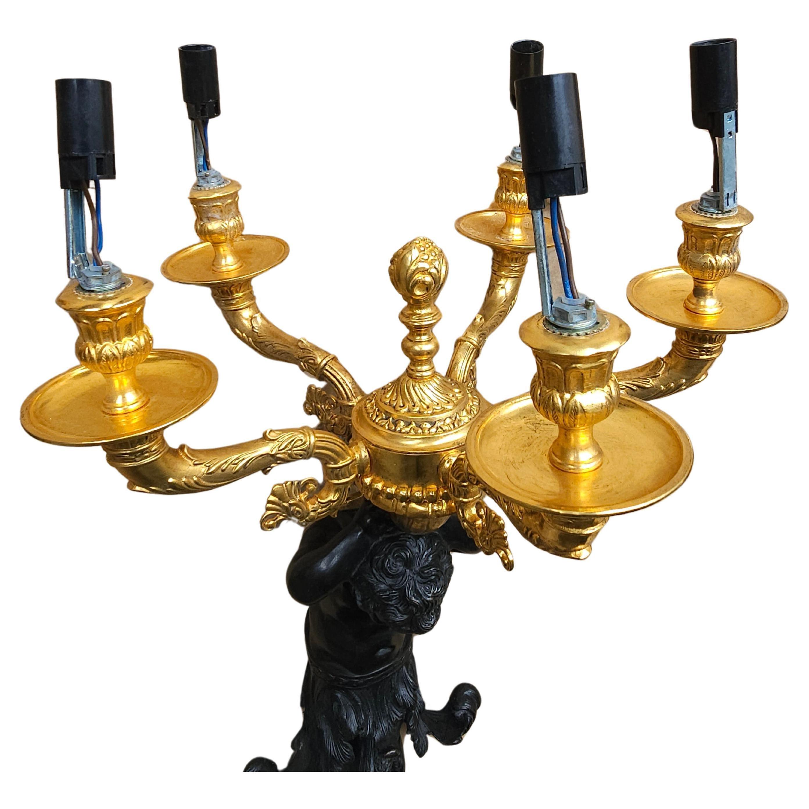 American Edward F. Caldwell Massive Patinated Bronze Triton Figural 5-Light Sconces, Pair For Sale