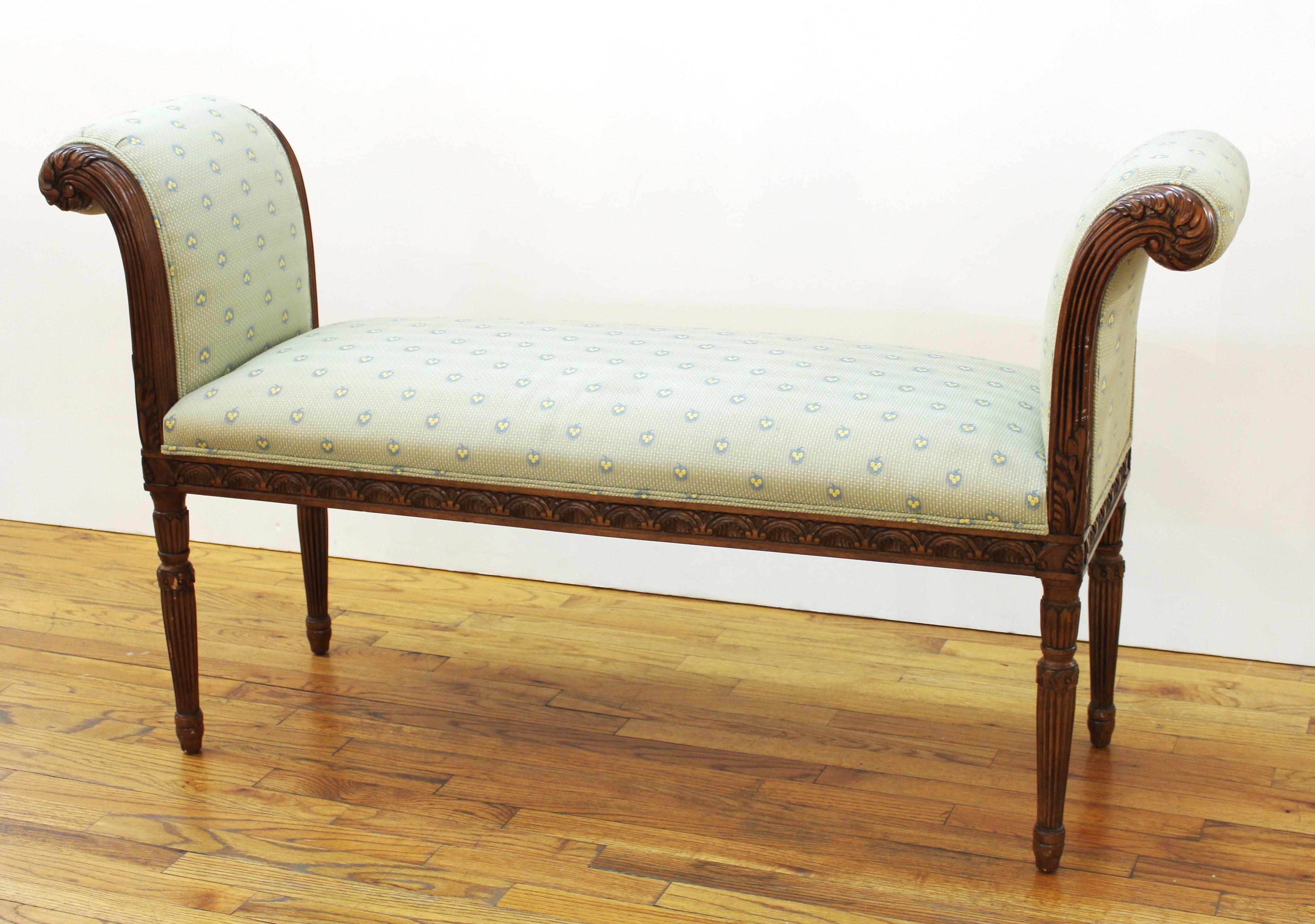 Edward Ferrell Neoclassical revival style window bench in carved wood with upholstered seat and scrolled arms. Makers label on bottom.