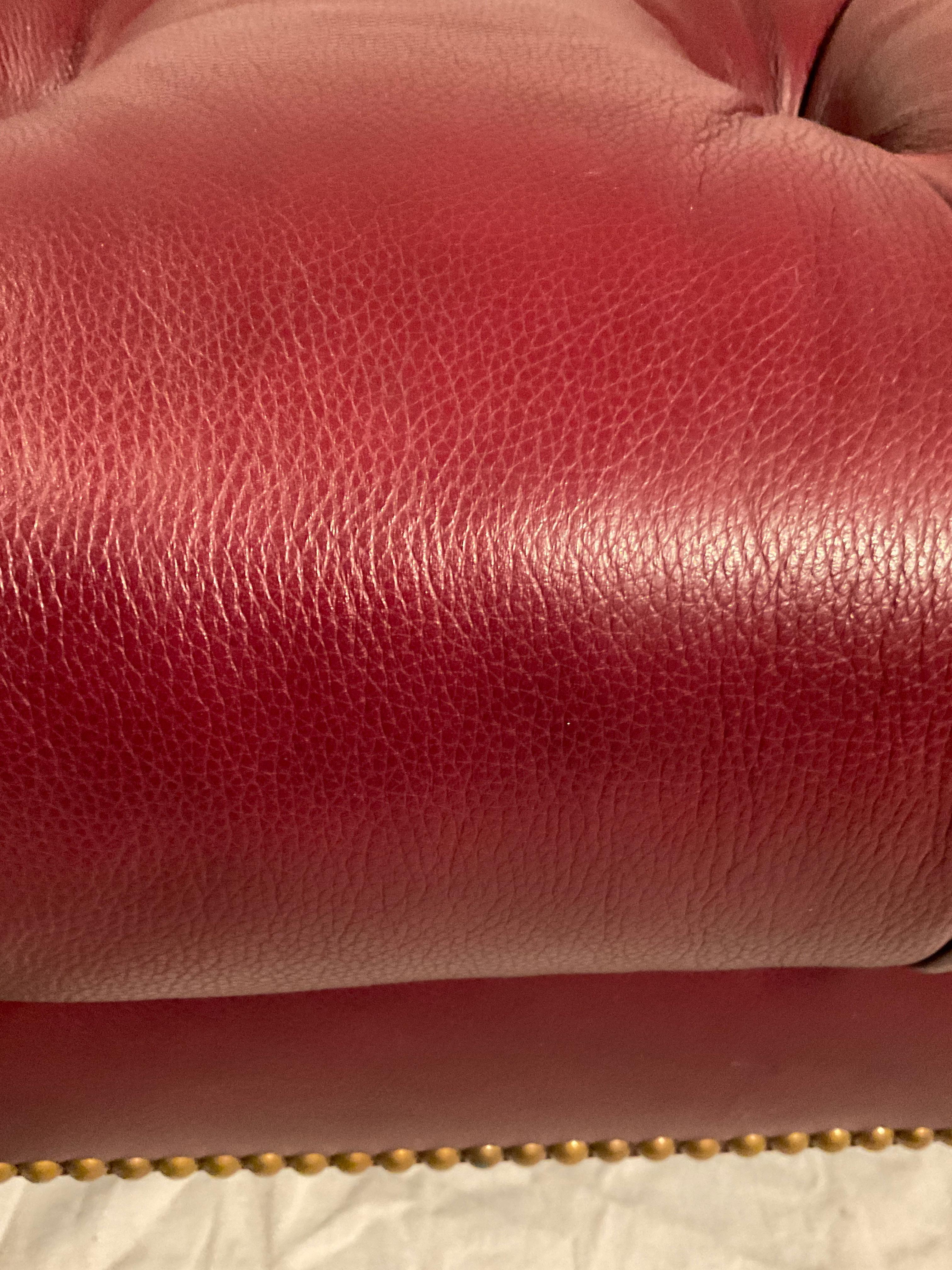 Edward Ferrell Tufted Red Leather Ottoman On Brass Casters For Sale 4