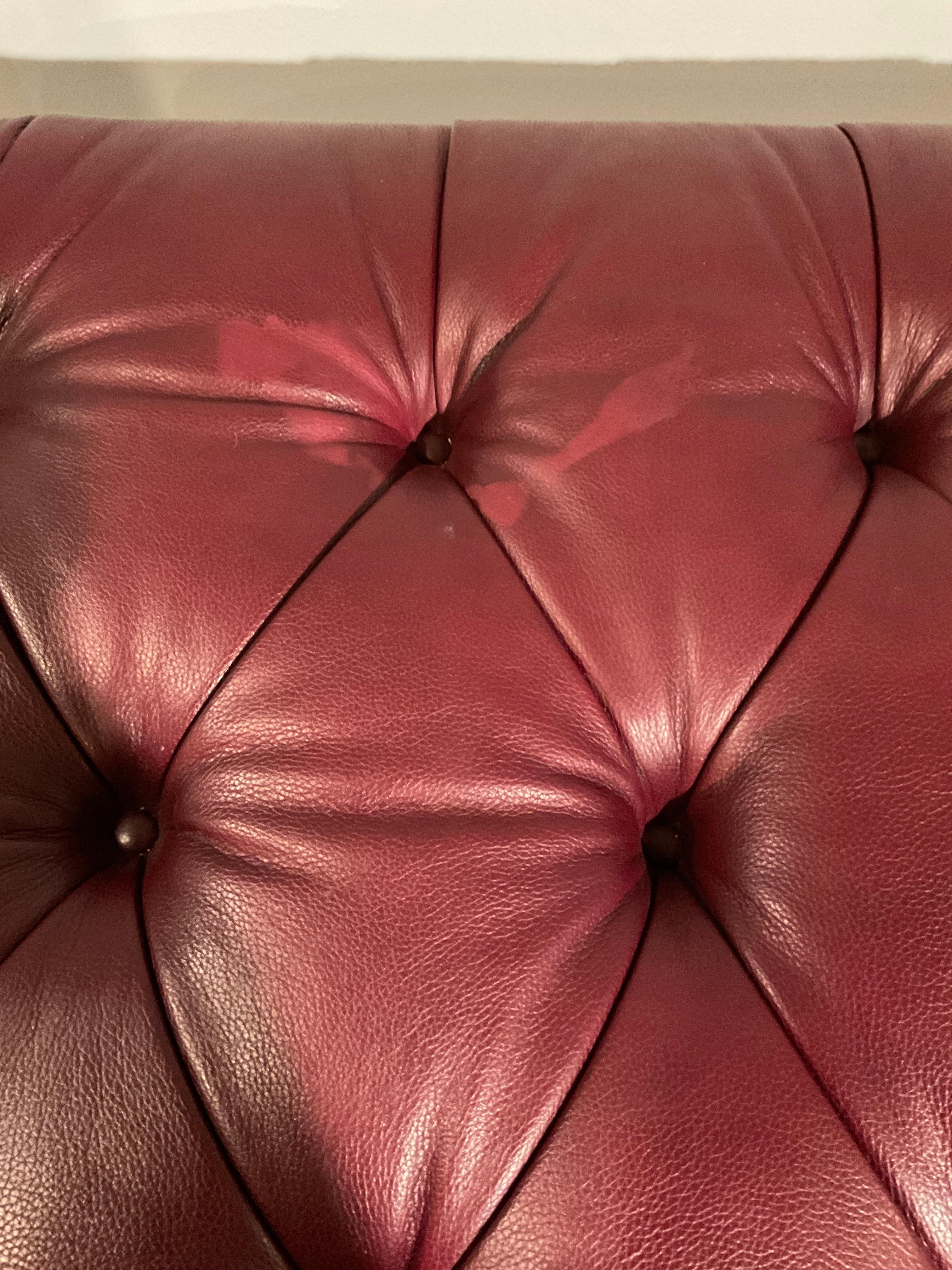 Edward Ferrell Tufted Red Leather Ottoman On Brass Casters For Sale 2