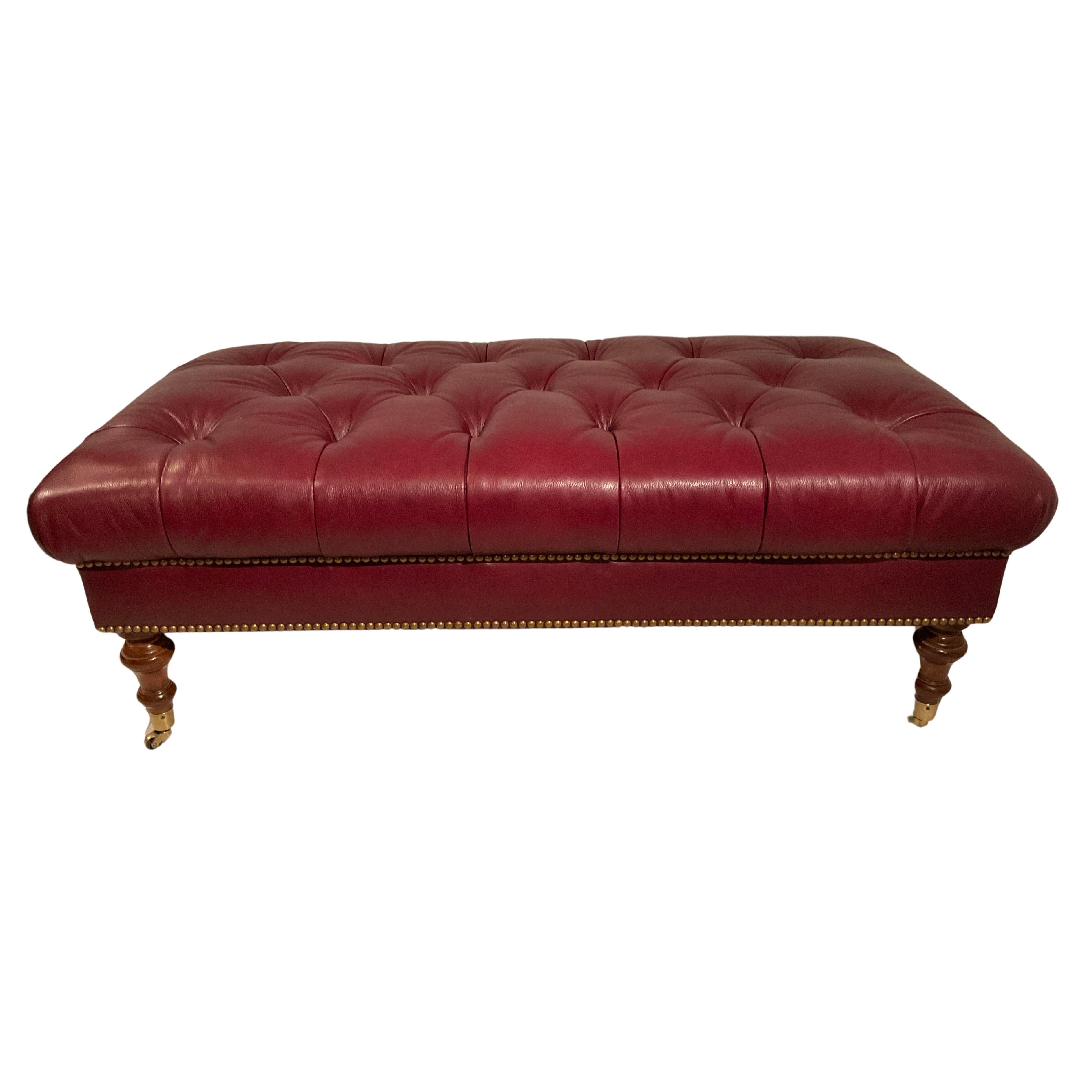Edward Ferrell Tufted Red Leather Ottoman On Brass Casters For Sale