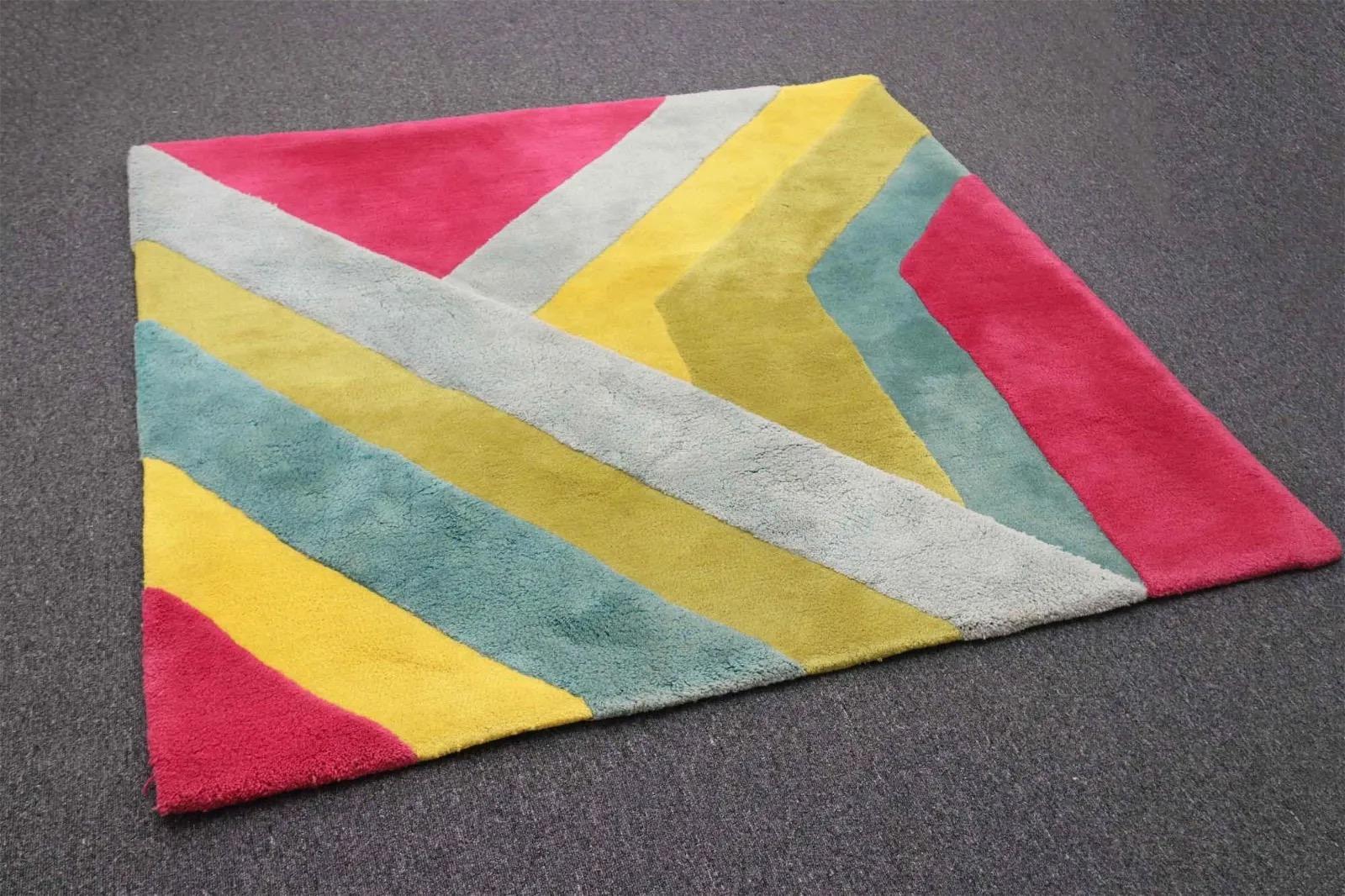 100% wool modern geometric design rug circa 1980 by Edward Fields.
Signed.
60 inches by 62 inches.