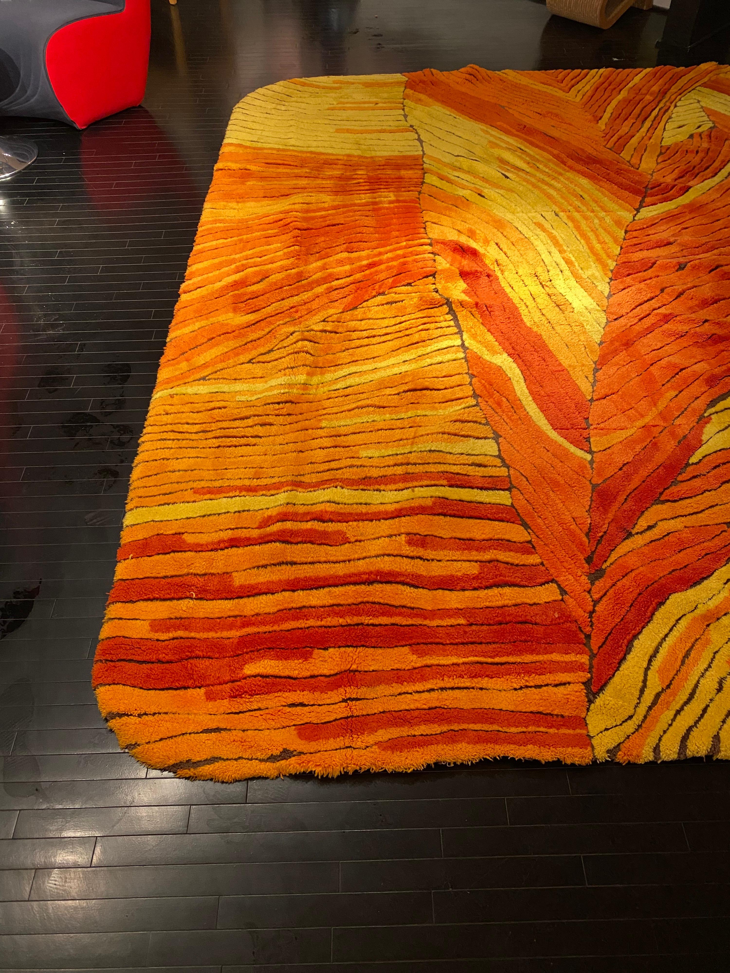 Edward Fields rug in shades of yellows and oranges. Custom Design for the Ponderosa Steak Houses Corporate Offices. Colors are bright and nap and pile in great shape. Rounded soft corners. 115