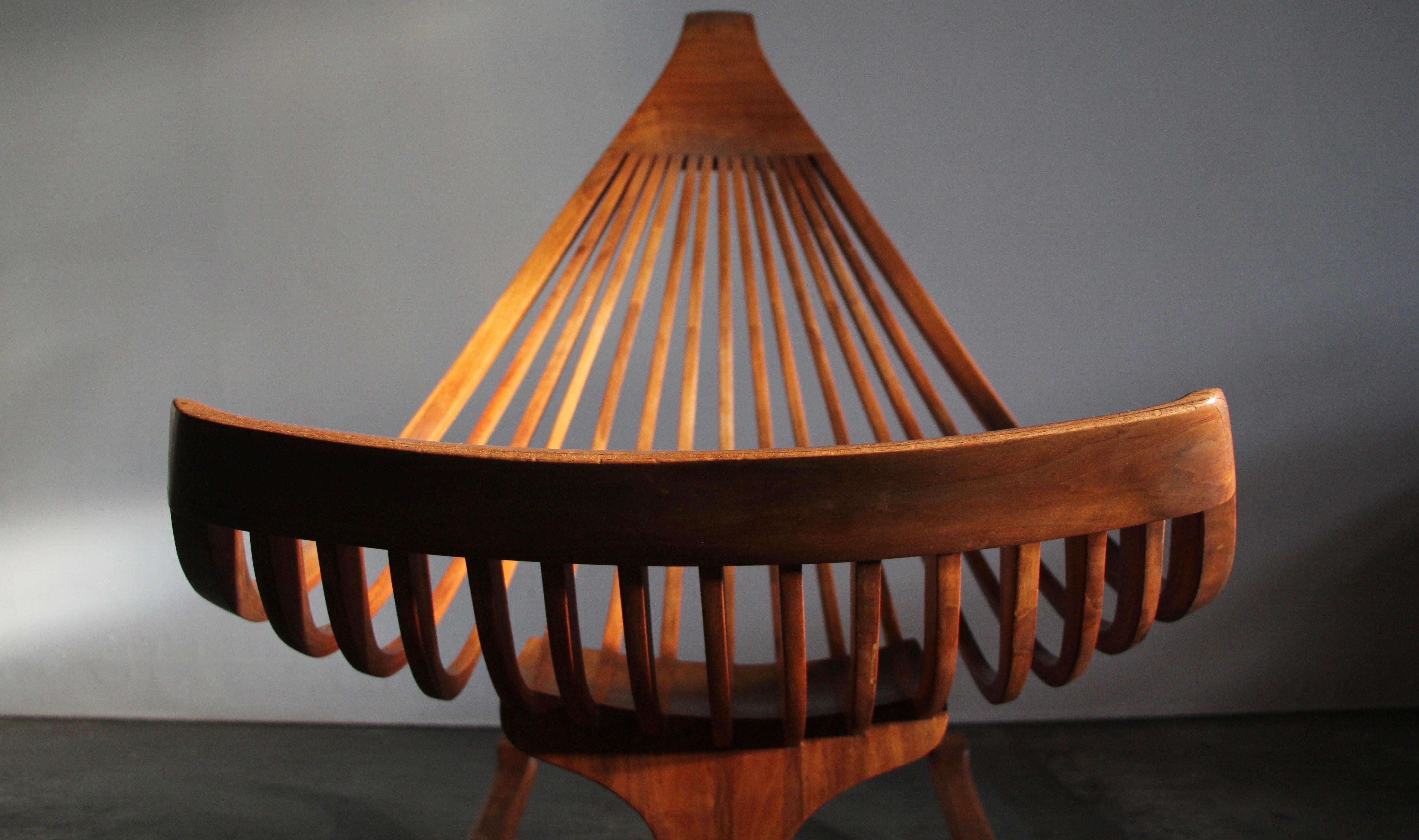 Equal parts sculpture, equal parts furniture, this divinely comfortable, large scale rocking chair by renowned Oregon artist/sculptor Edward G. Livingston, is, quite simply, a masterpiece of studio craft design. Stunning organic form, masterful