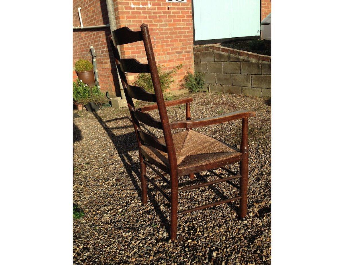 Edward Gardiner. An English Cotswold School early oak ladder back rush seat armchair.
These ladder back chairs are steeped in history, their design has evolved from a long line of English chair makers going back to the late 17thC and 18thC.
Edward